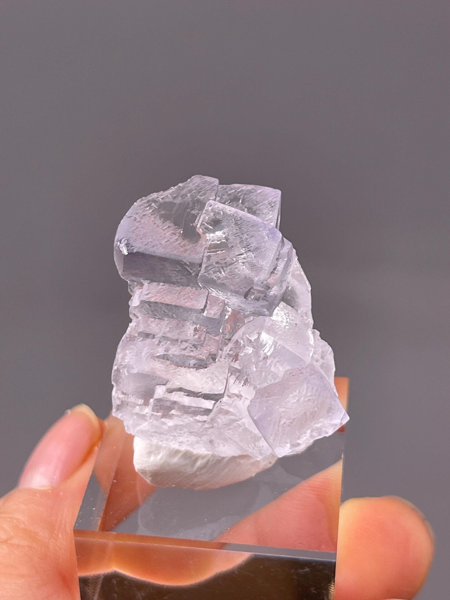 Transparent fluorite crystal with natural etch patterns