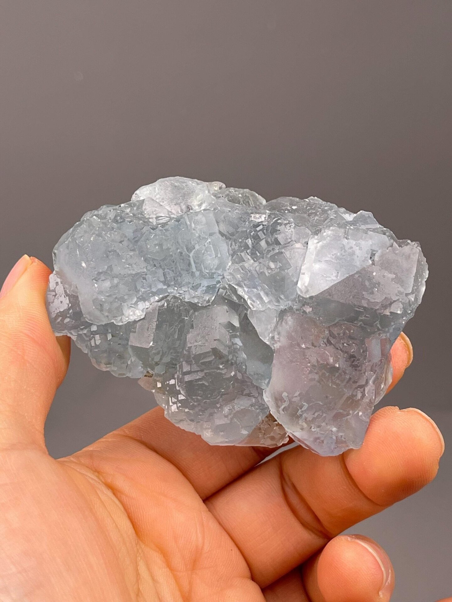 Full blue-green fluorite specimen on white background