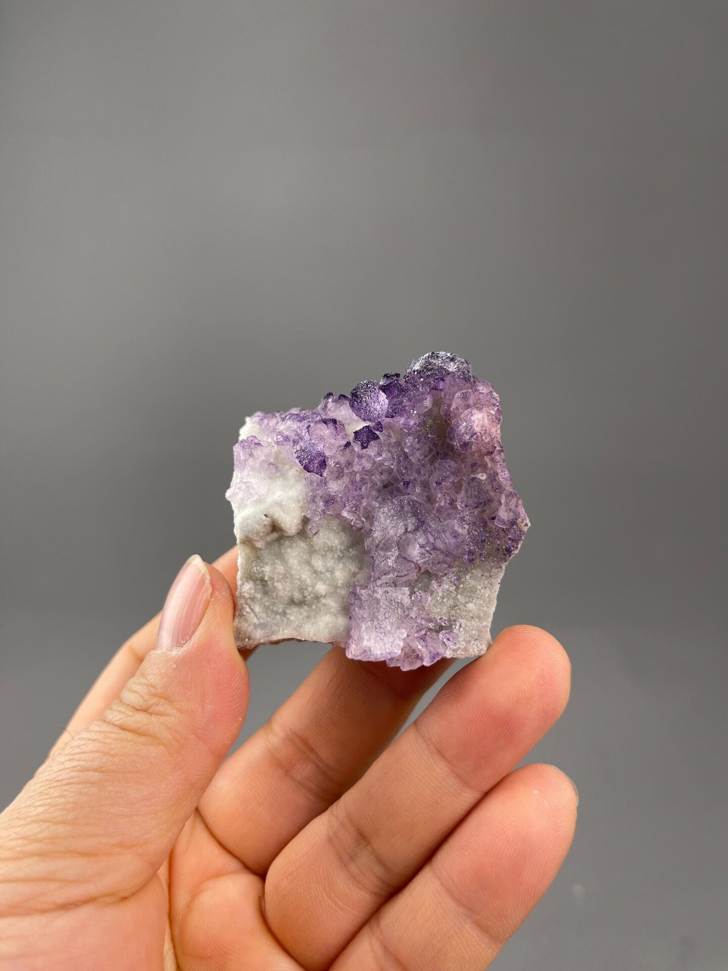 Purple fluorite pattern cluster side profile