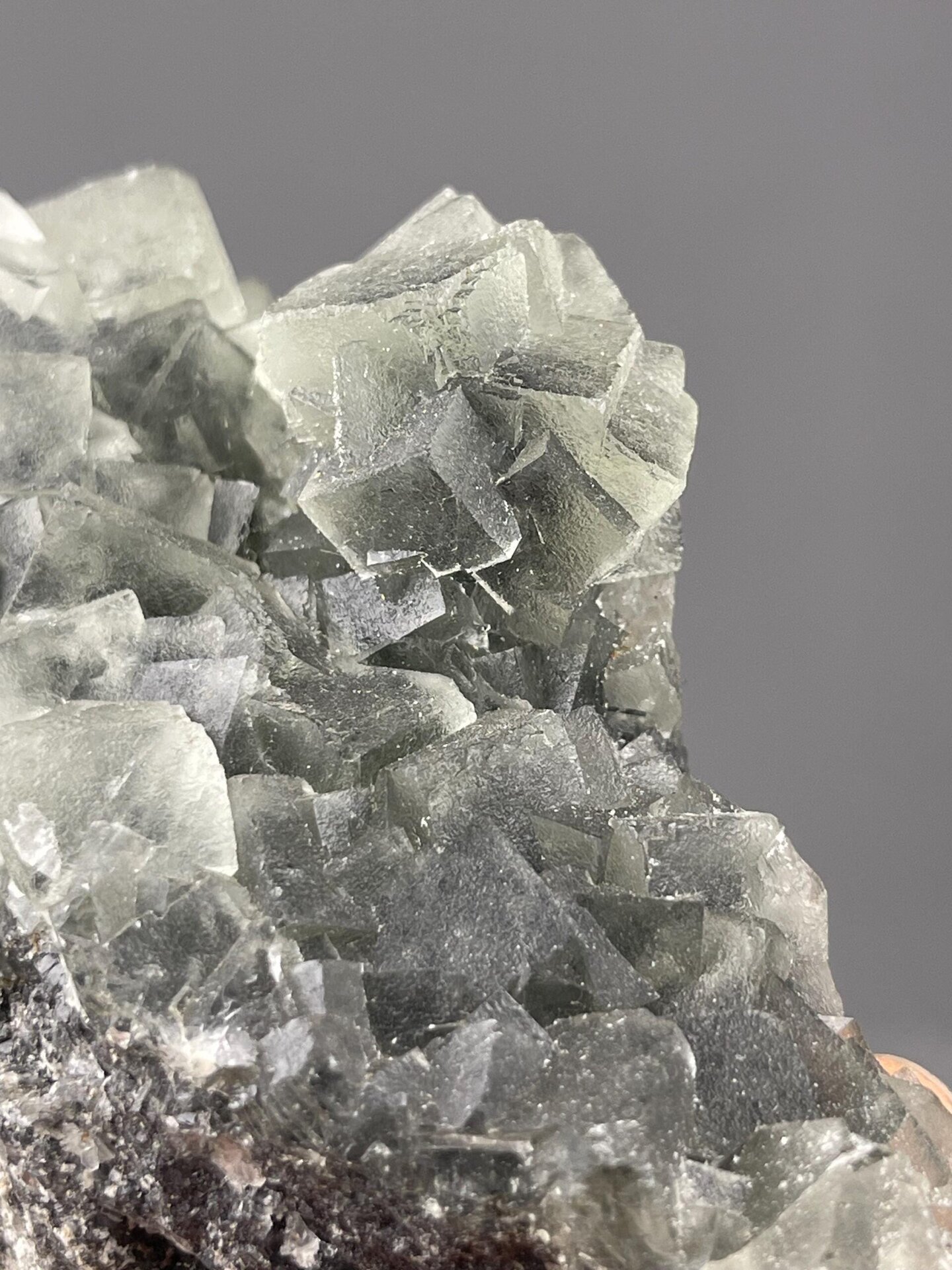 Green fluorite crystal stacking close-up