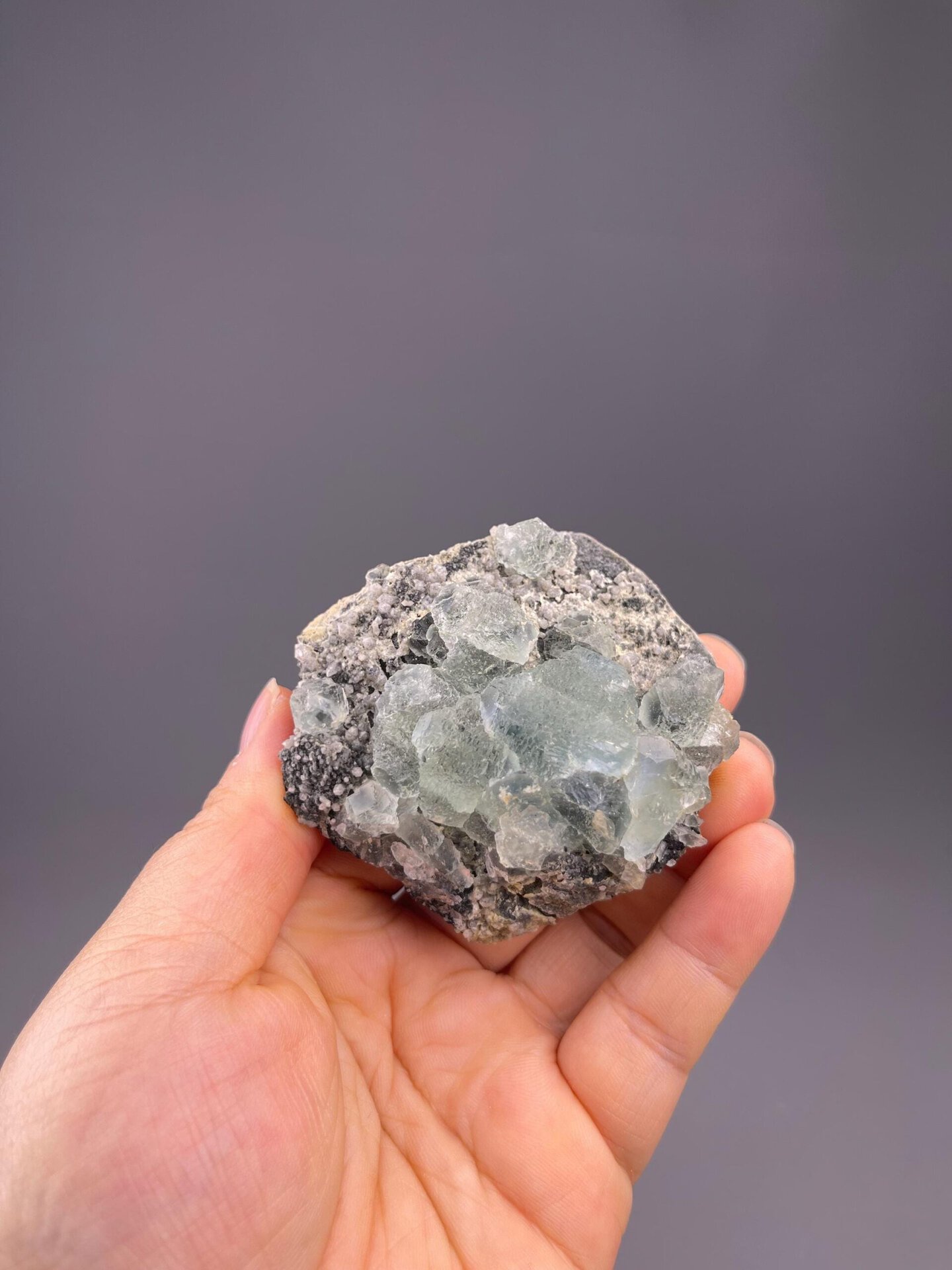 Mint-green cubic fluorite crystals close-up