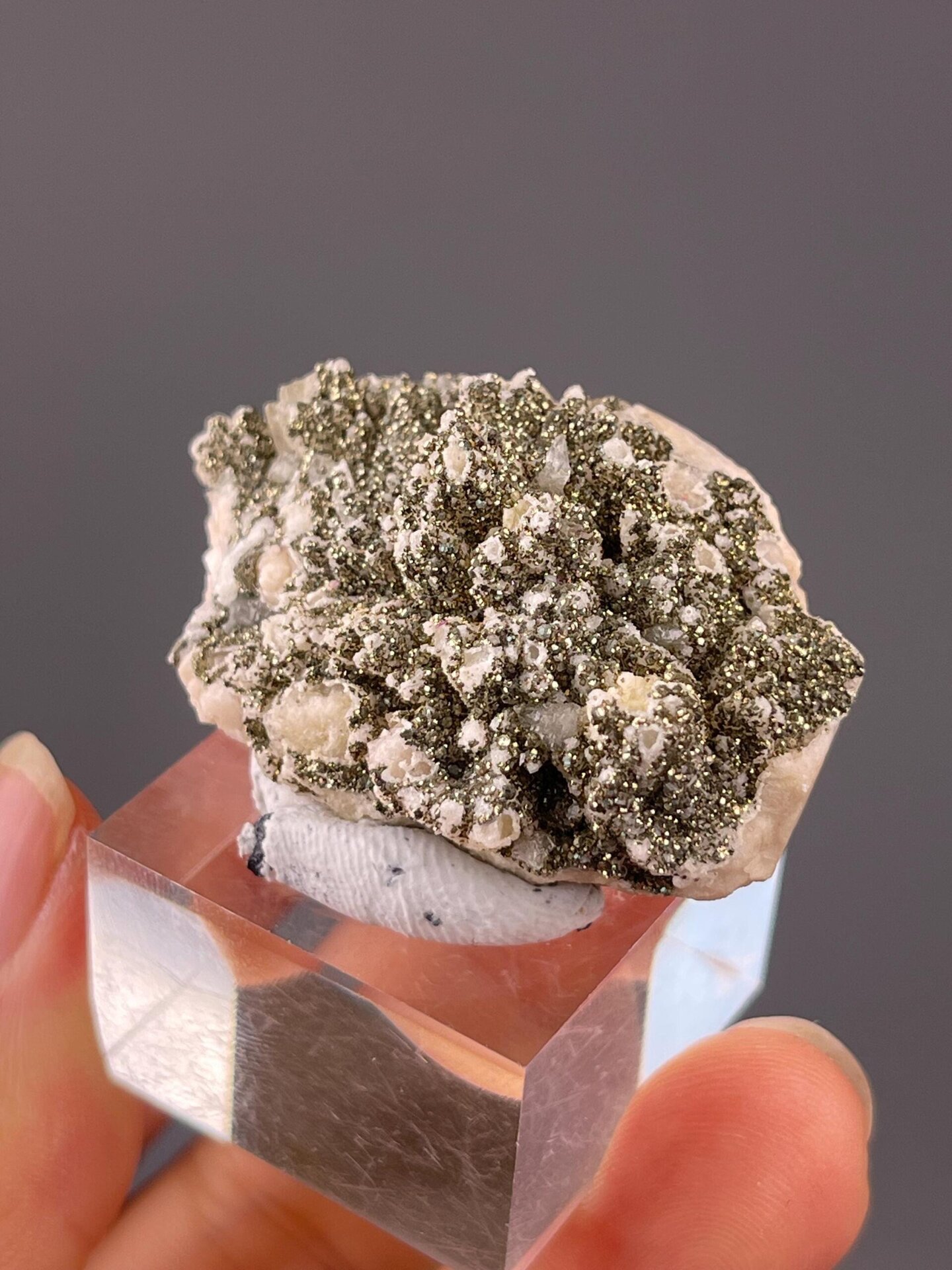 Dolomite matrix base with pyrite scatter