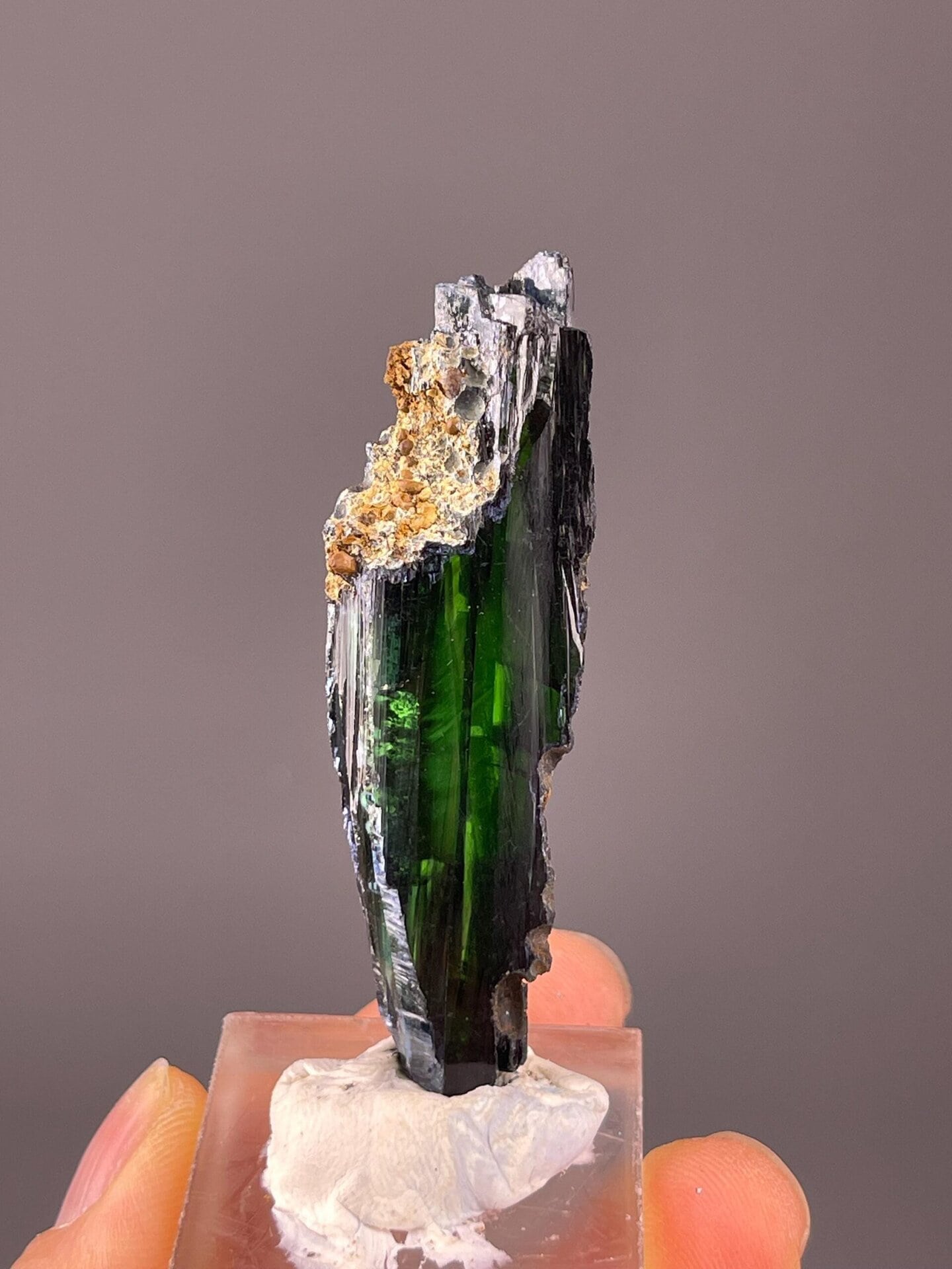 Green crystal base and matrix detail