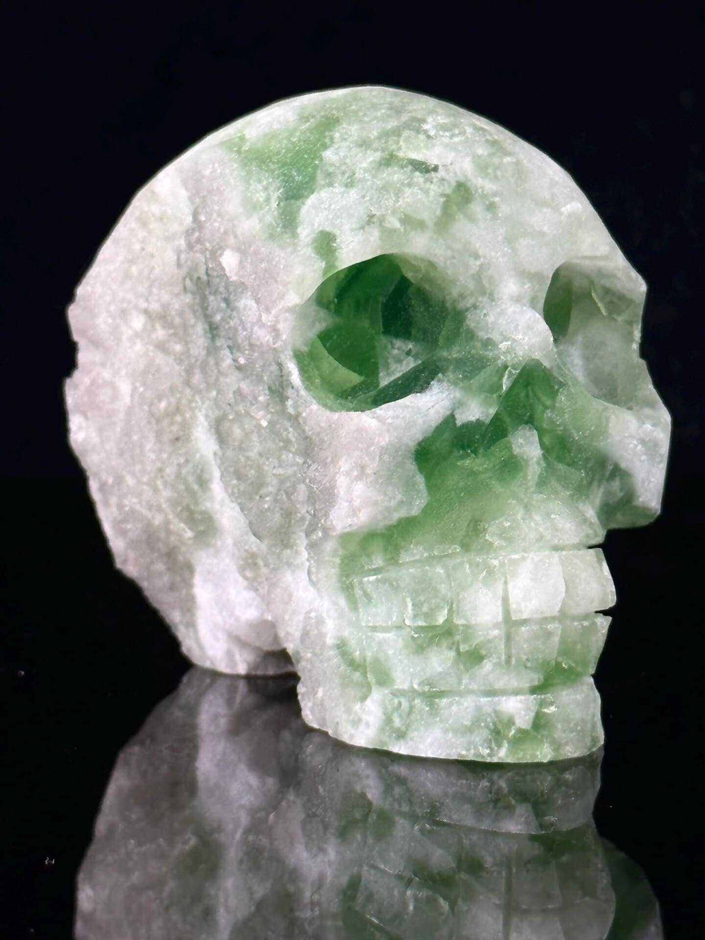 Green fluorite skull three-quarter view