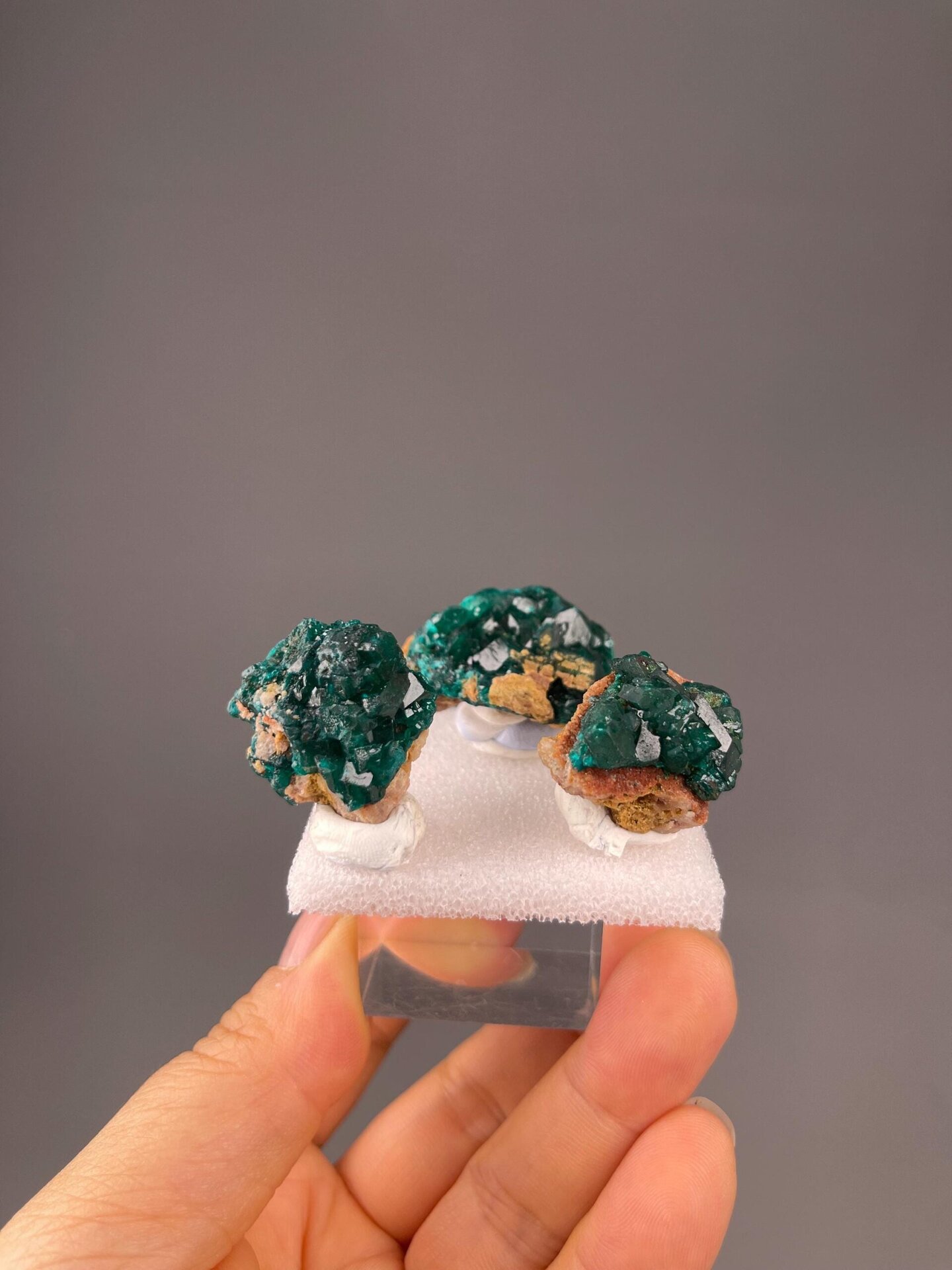 Full three-piece dioptase set on white background