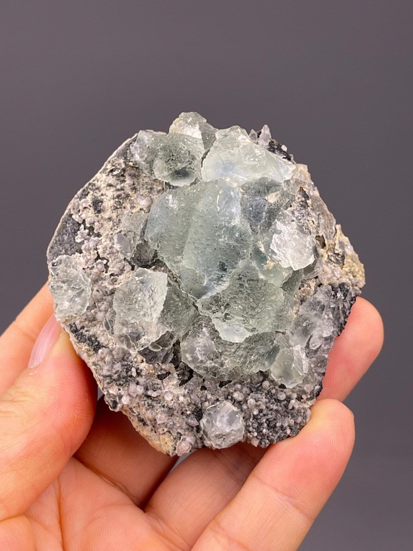 Green fluorite crystal faces luster detail