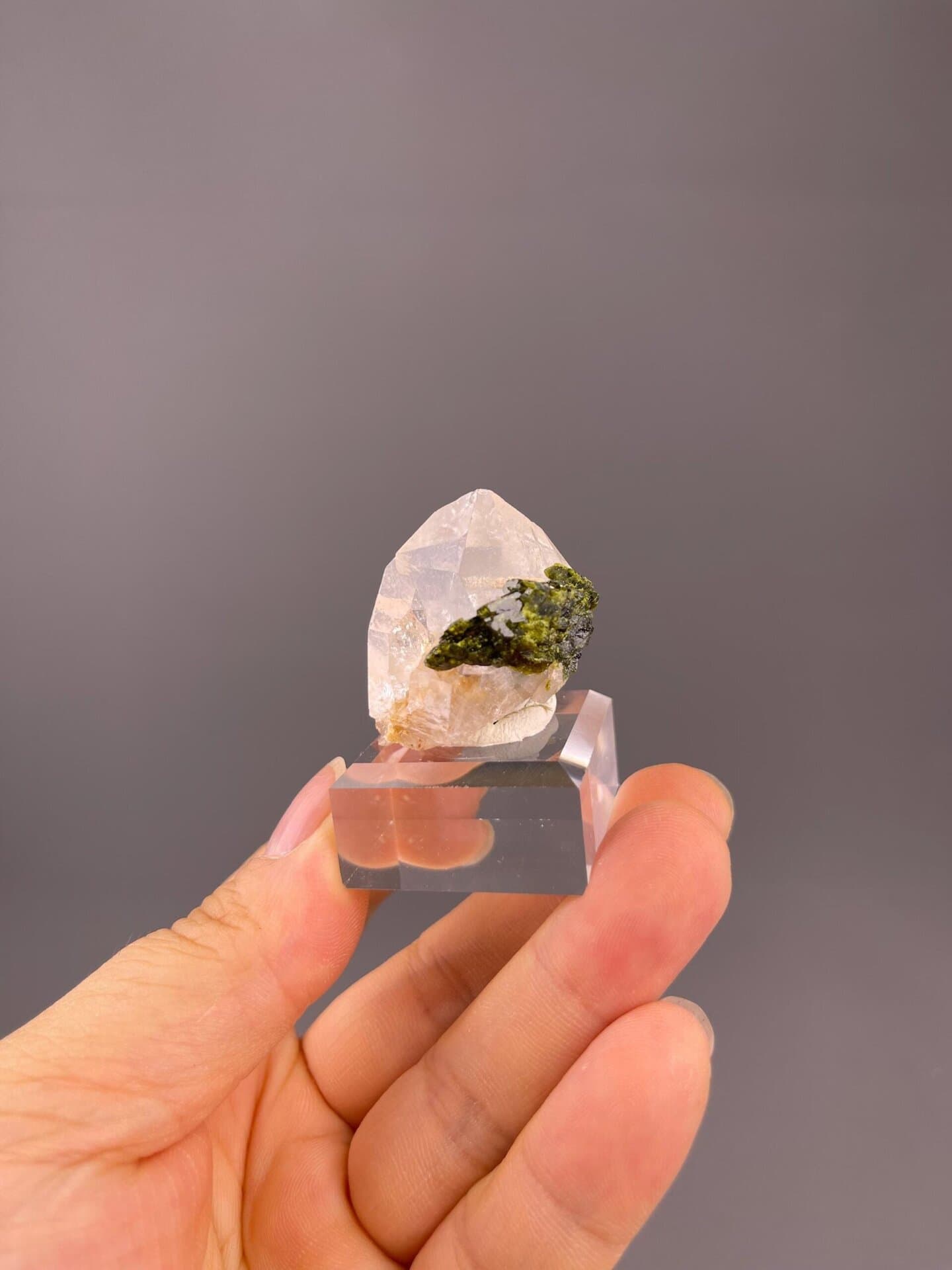 Mossy green chlorite landscape inside quartz crystal