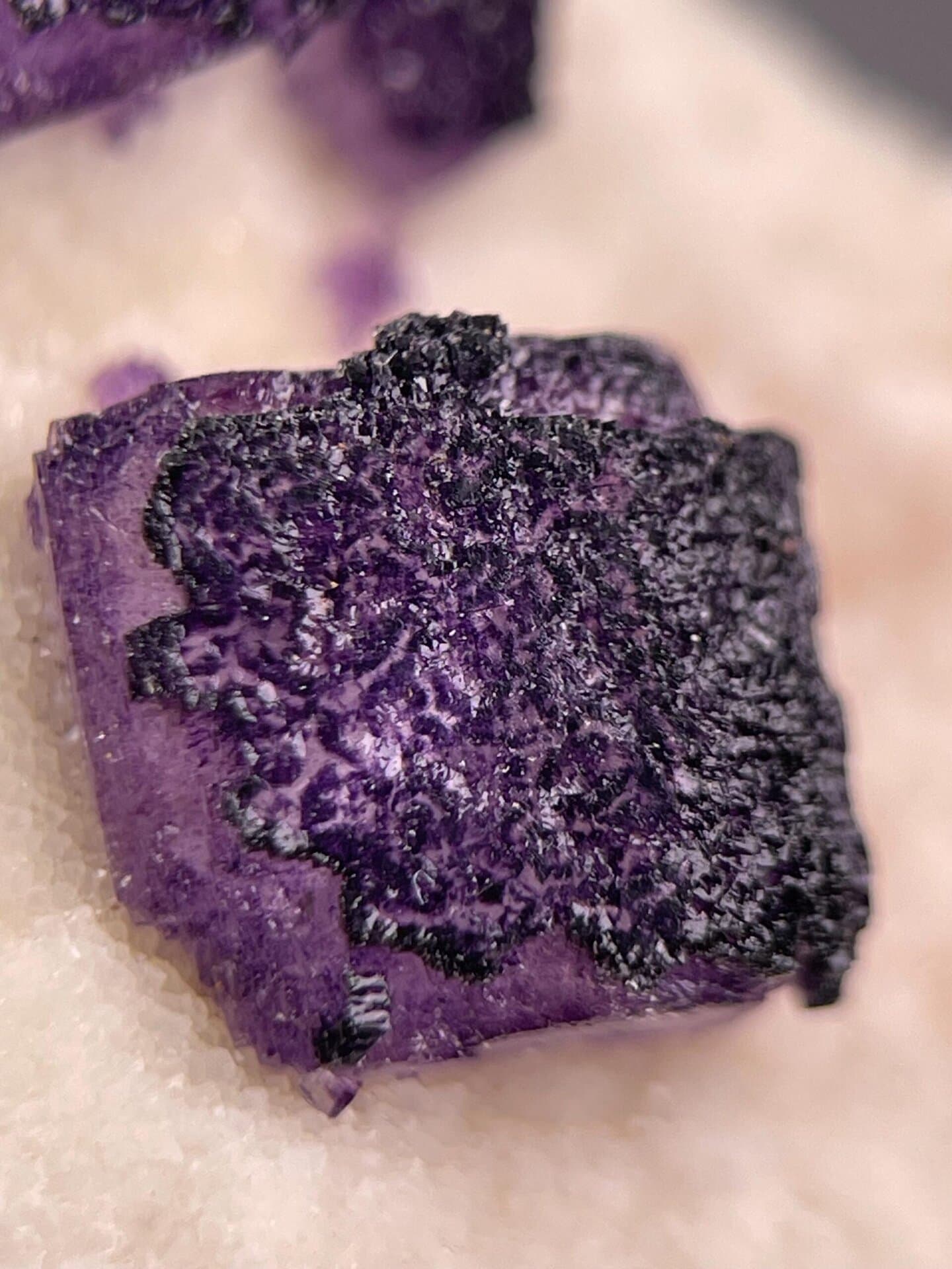 Side view of patterned purple fluorite