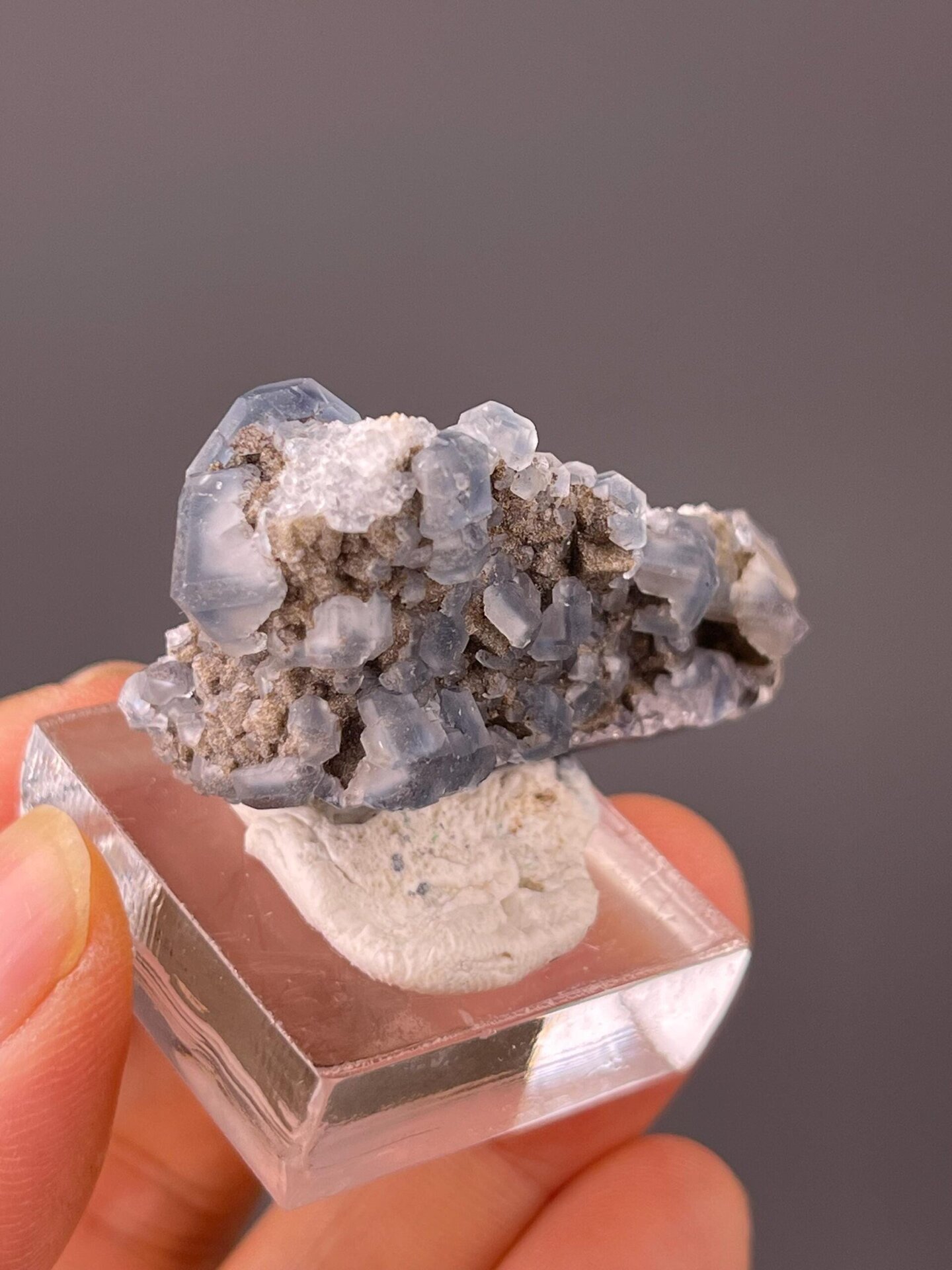 Fujian tanzanite-blue fluorite under studio lighting