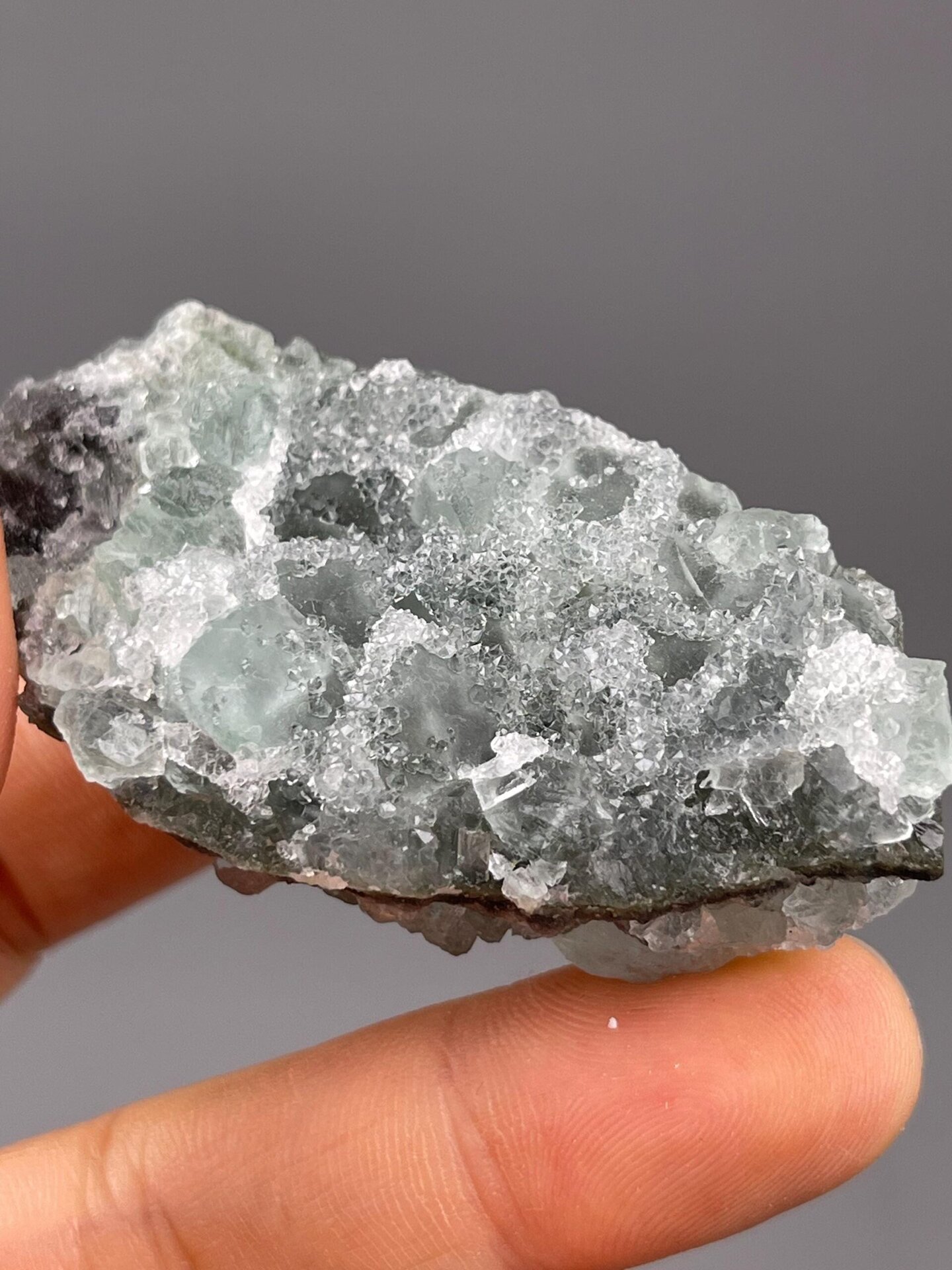 Back view of sugar-coated fluorite cluster base