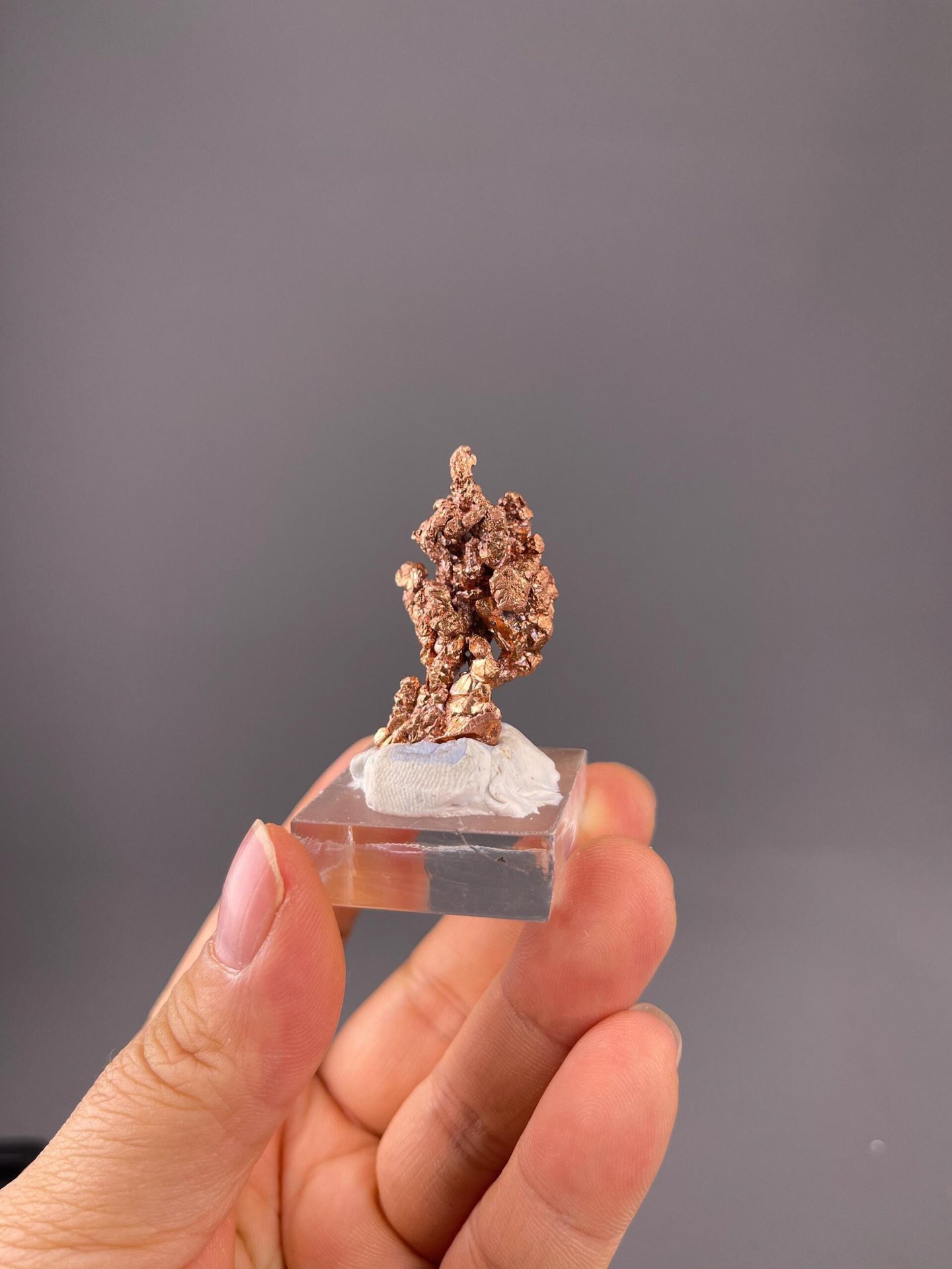Close-up of reddish metallic copper surface texture