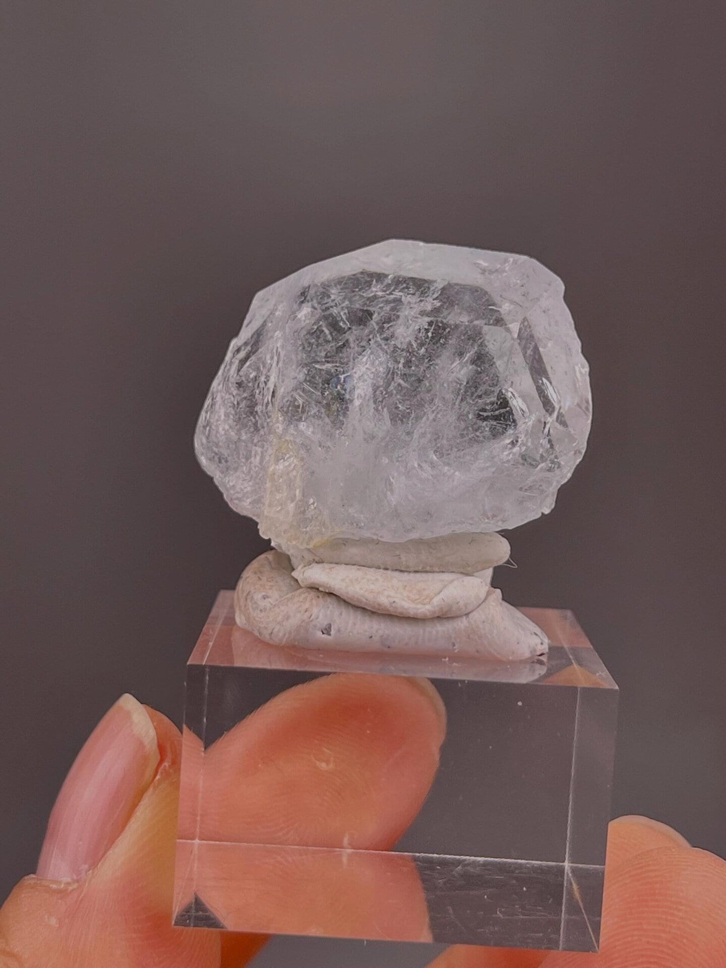 Semi-transparent aquamarine under studio lighting