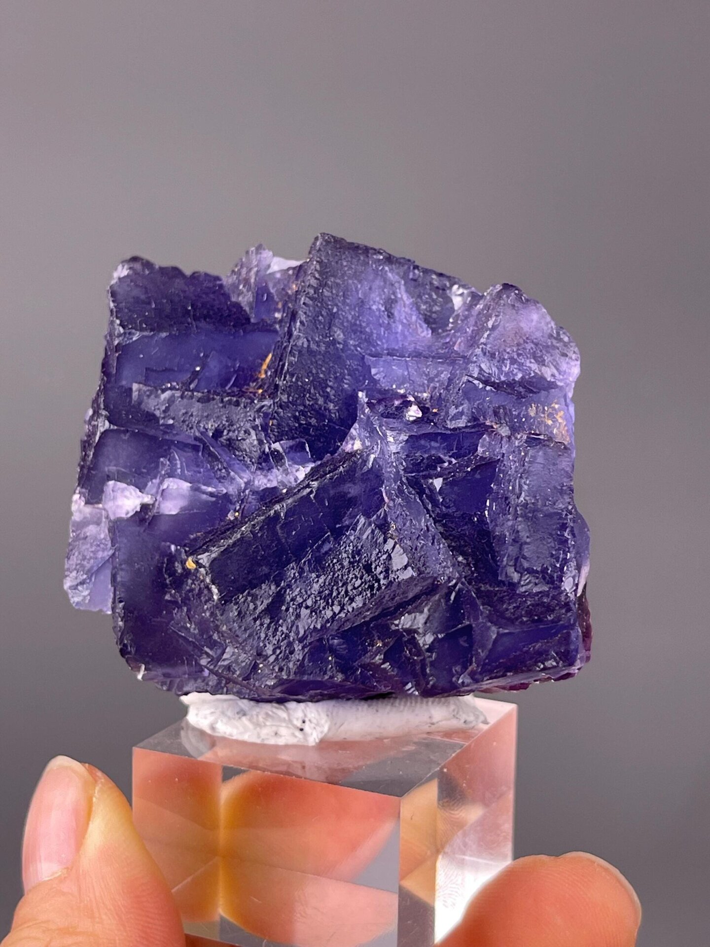 Front view of deep purple fluorite cubic crystals from Guizhou