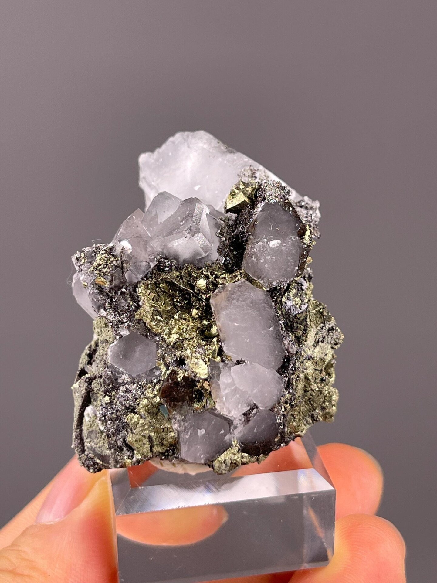 Front view of colorless fluorite with pyrite from Hunan