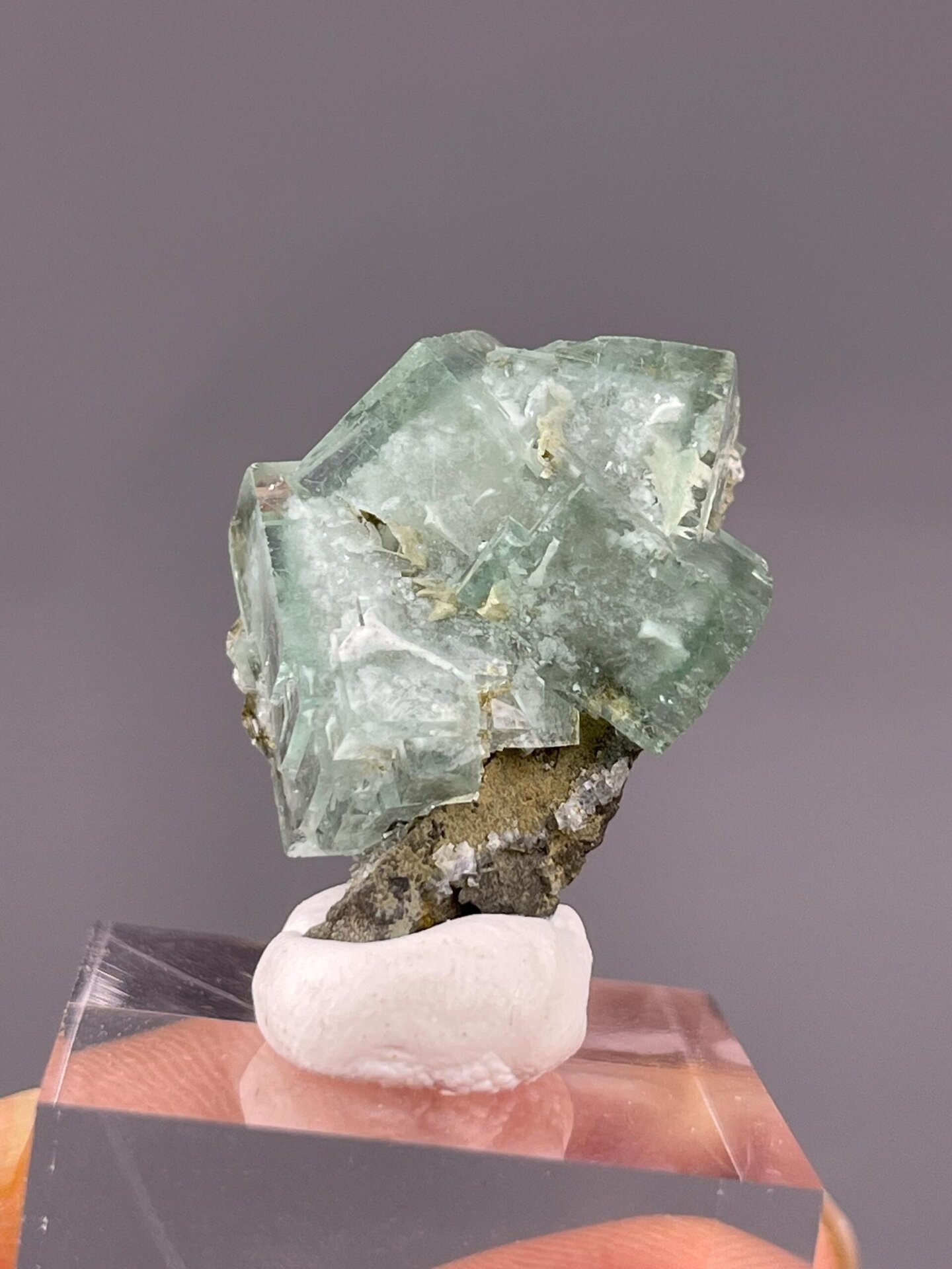 Translucent green fluorite under studio lighting