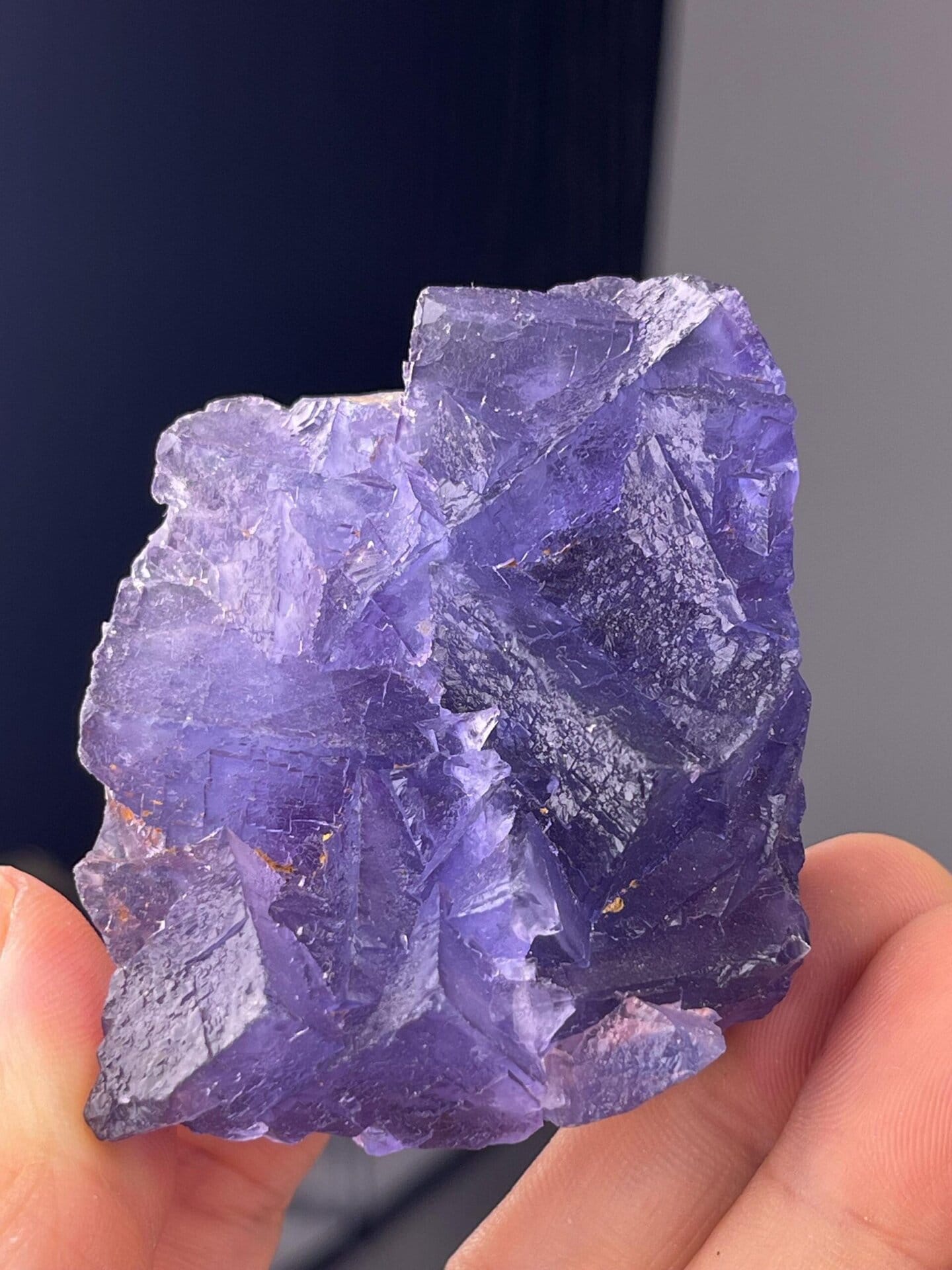 Deep purple fluorite under studio lighting