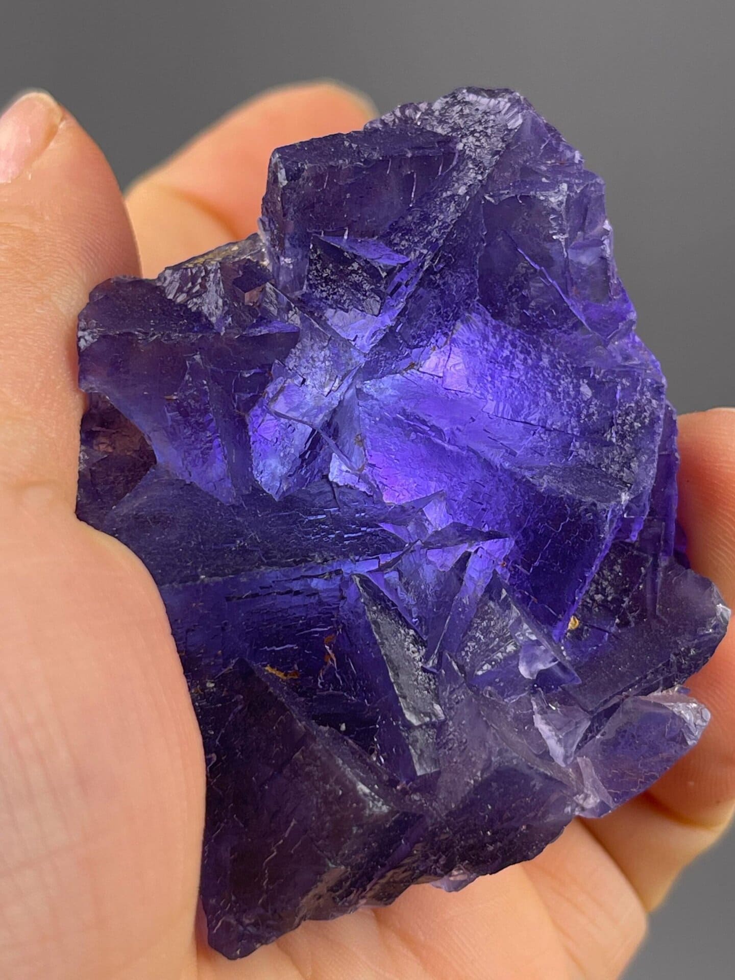 Back view of purple fluorite cluster base