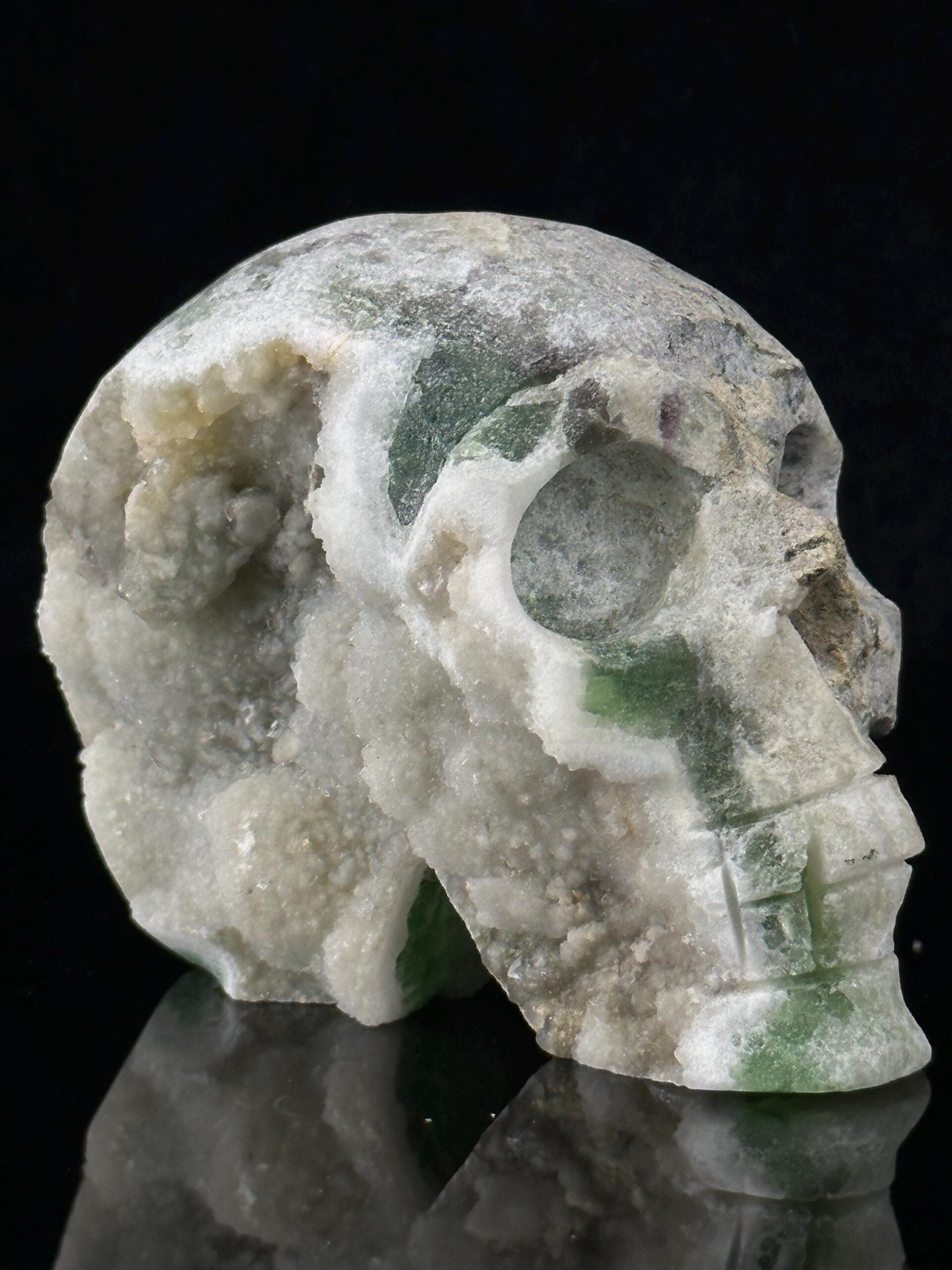 Front view of hand-carved green fluorite skull from Madagascar