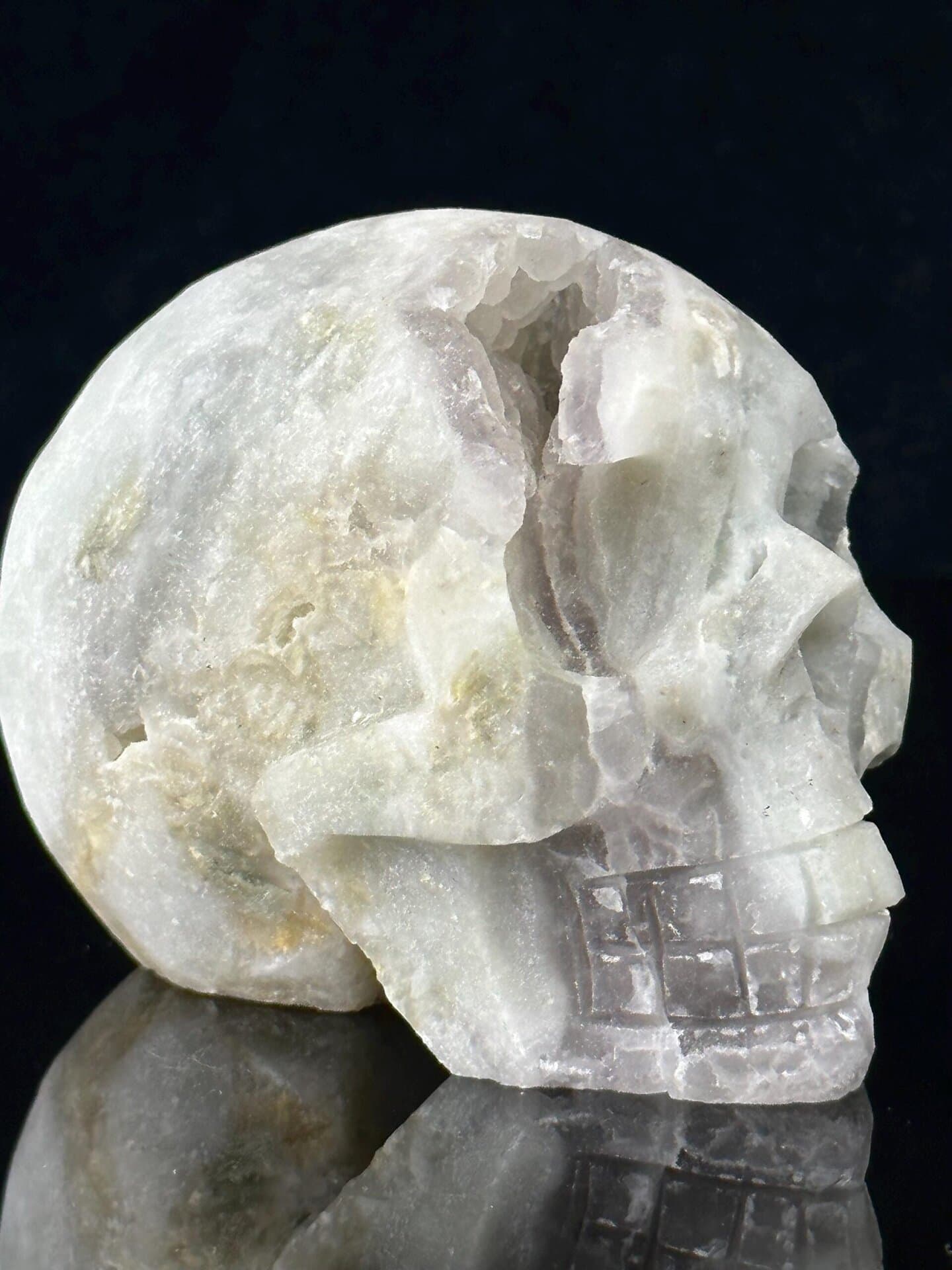 Close-up of metallic pyrite shimmer in fluorite skull