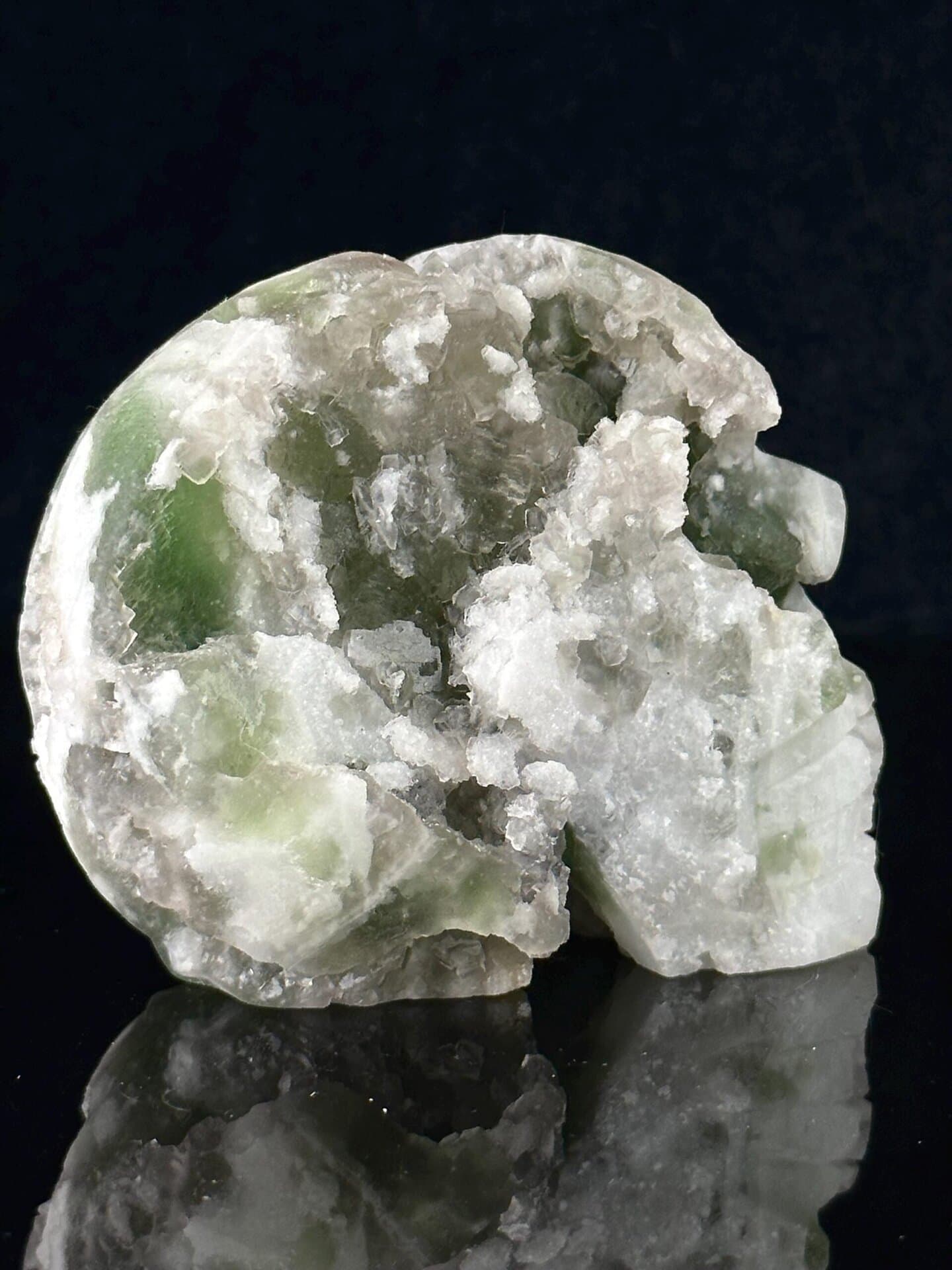 Three-quarter angle of green fluorite crystal skull