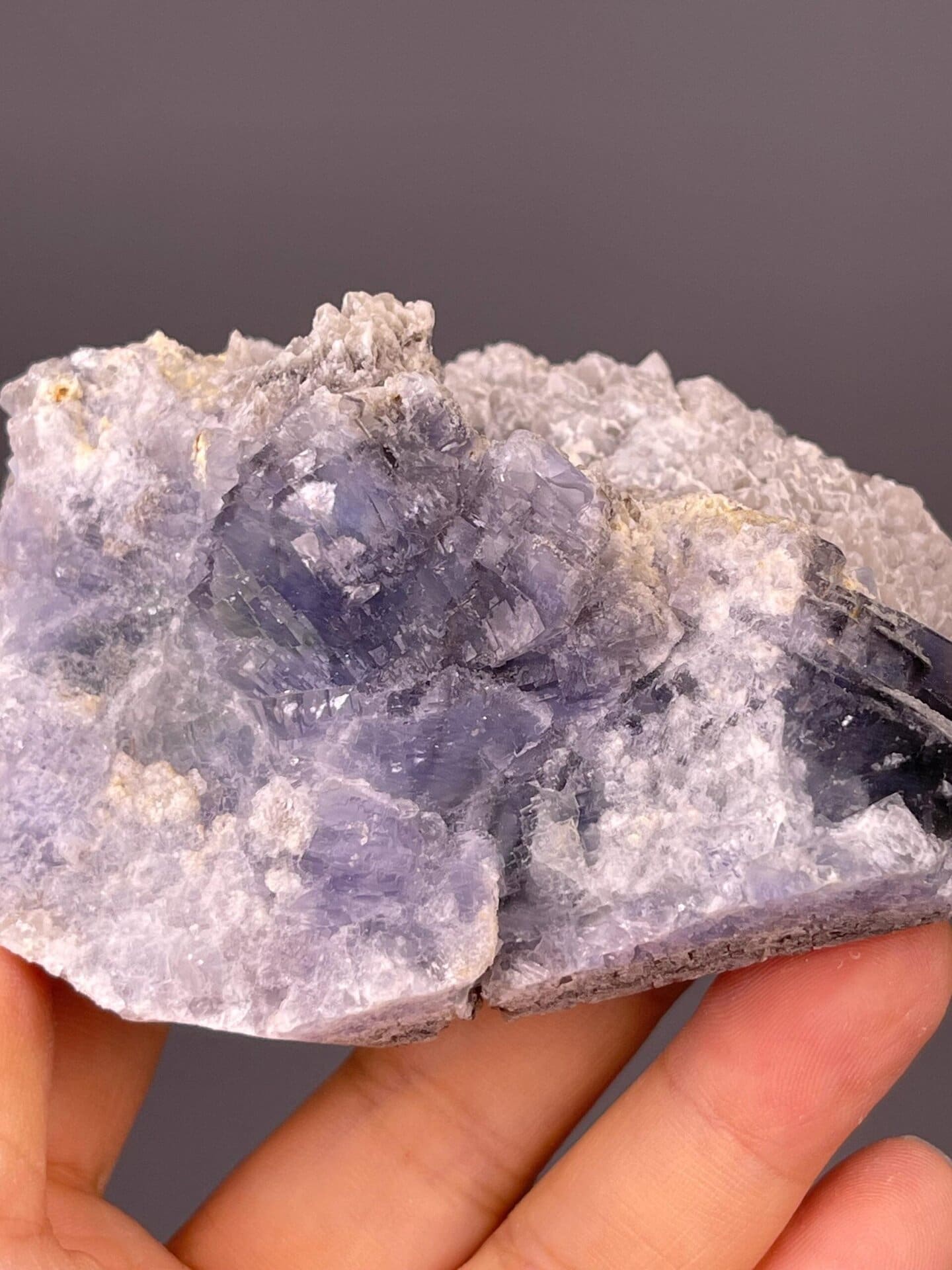 Etched surface texture on blue fluorite crystals