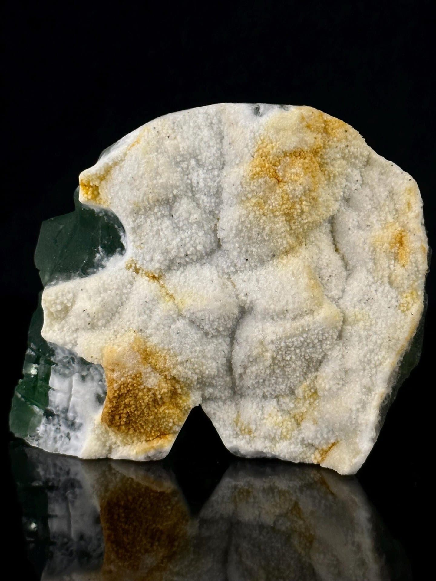 Back of fluorite skull showing natural mineral matrix
