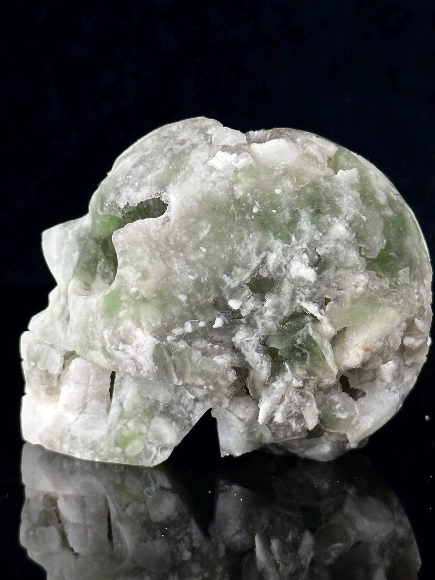 Scale reference of large green fluorite skull 3.4 inches