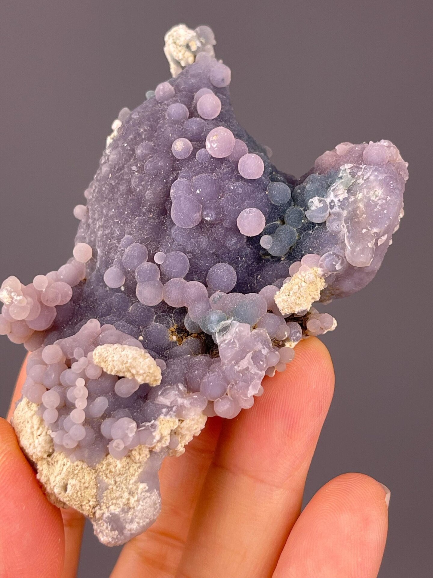 Back view of grape agate cluster base