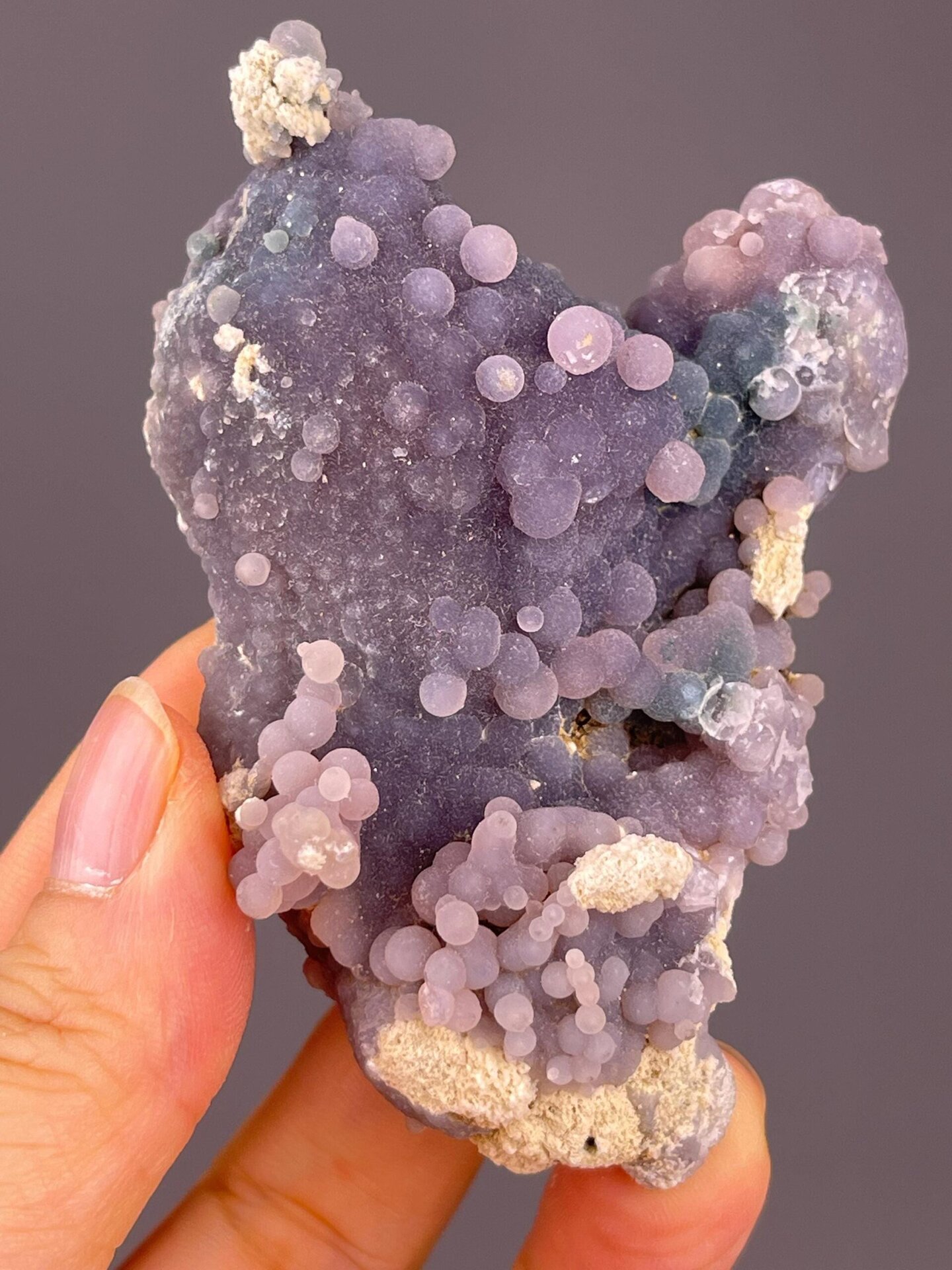 Waxy luster detail on grape agate chalcedony surface