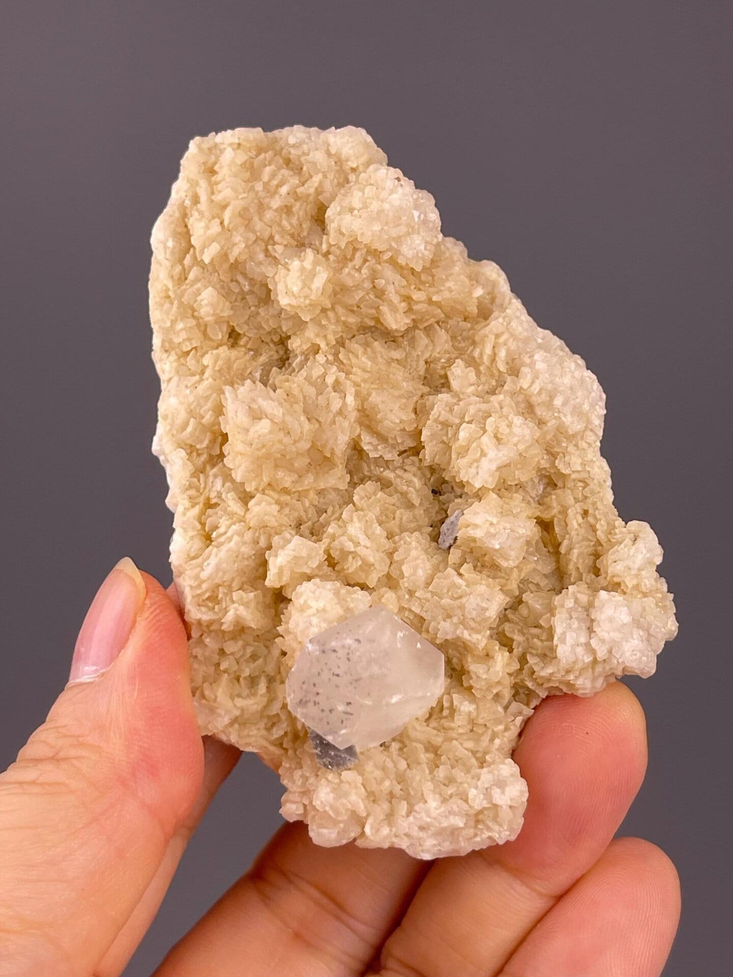 Transparent fluorite crystal on dolomite microcrystal bed, China