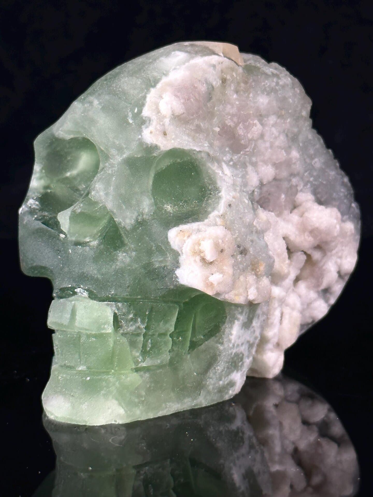 Front view of hand-carved green fluorite crystal skull