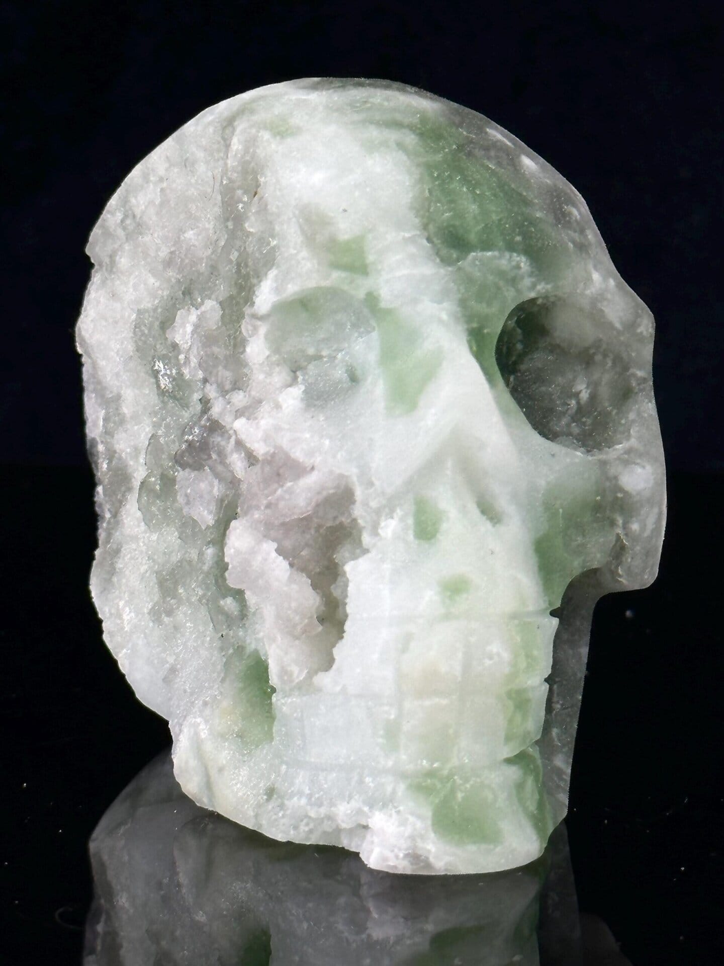 Front view of hand-carved green fluorite skull
