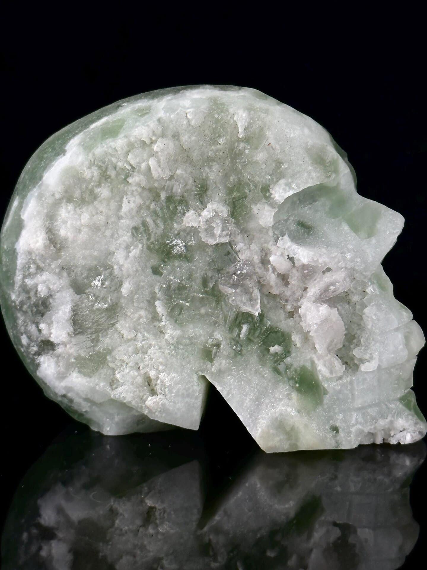 Top view of green fluorite skull showing carving detail