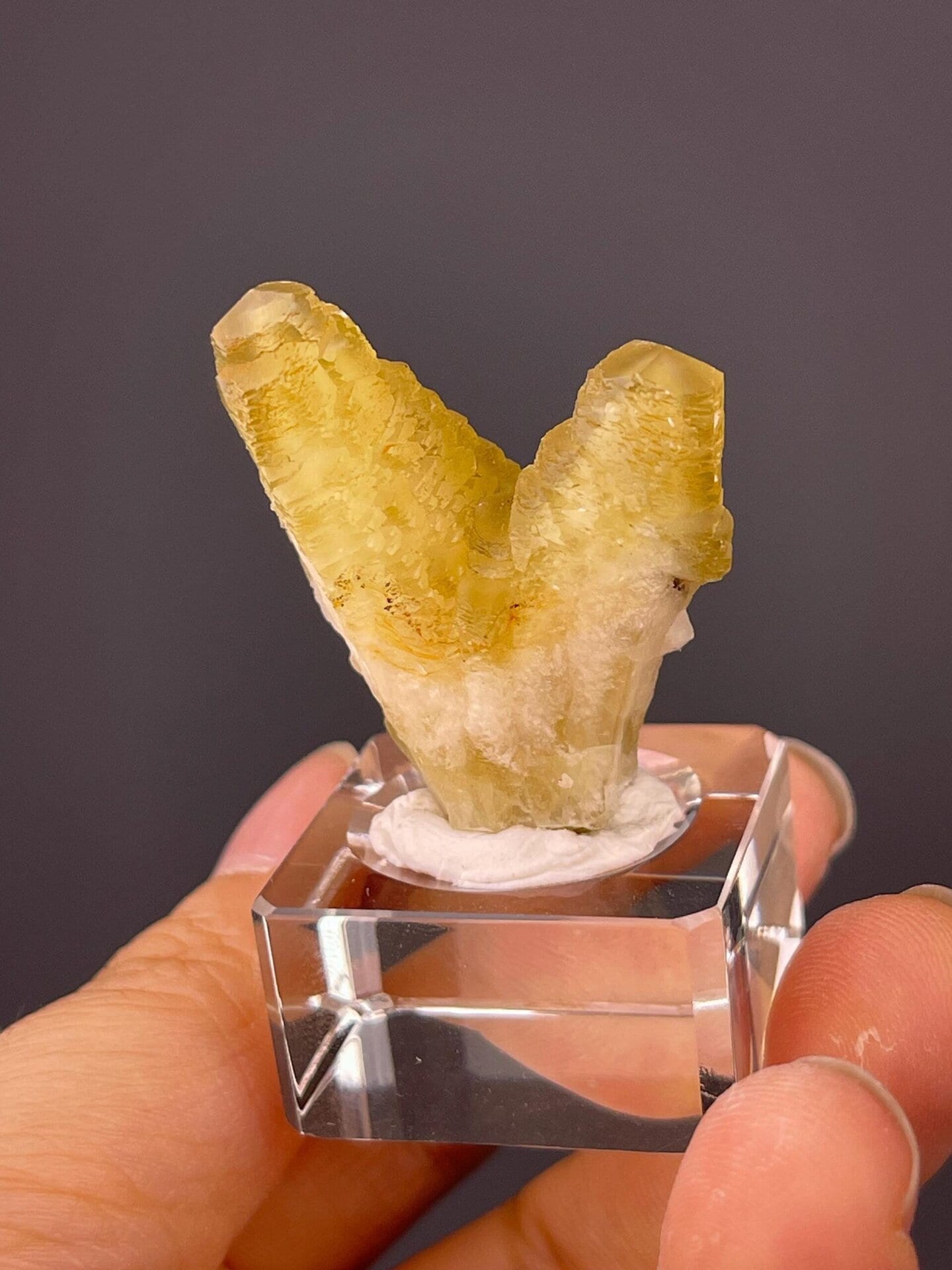 Yellow calcite crystal transparency under studio light