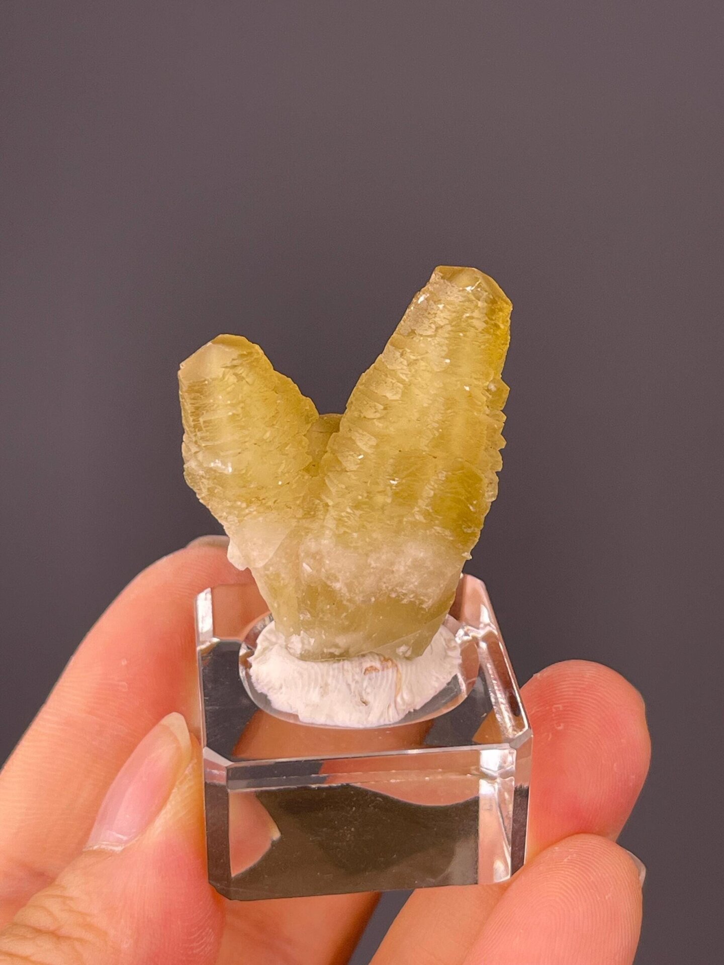 Base of double-terminated calcite showing matrix contact