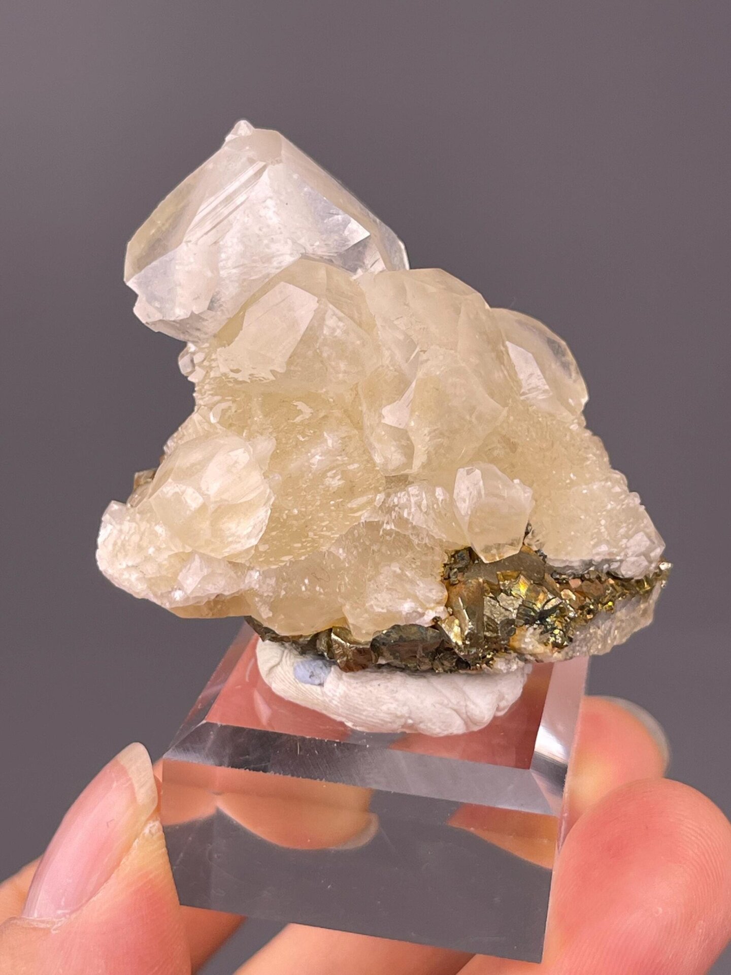 Angled view of calcite on pyrite cluster