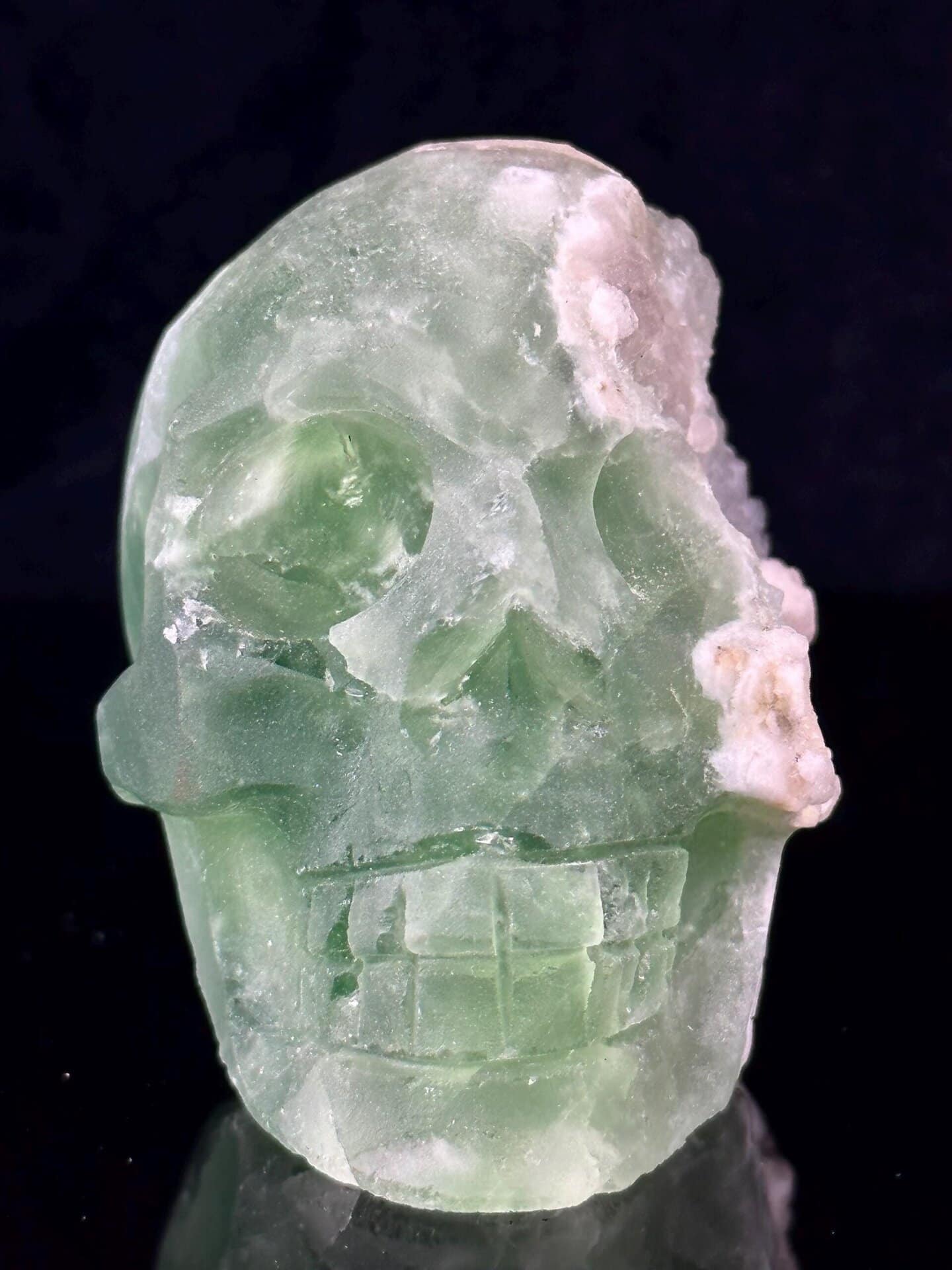 Detail of raw fluorite mineral texture on skull carving