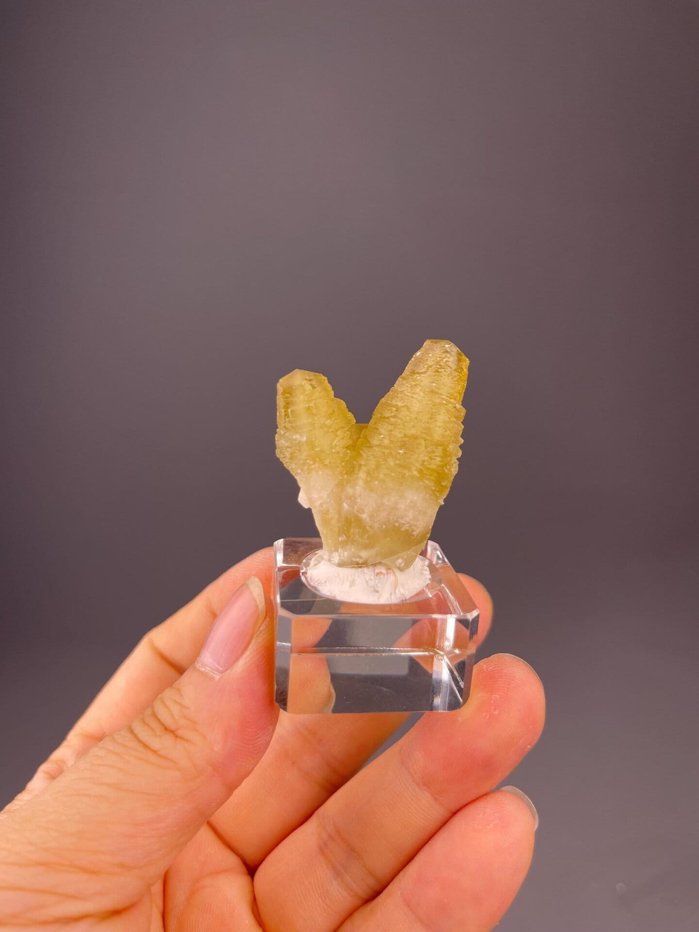 Scale reference of double-terminated yellow calcite specimen