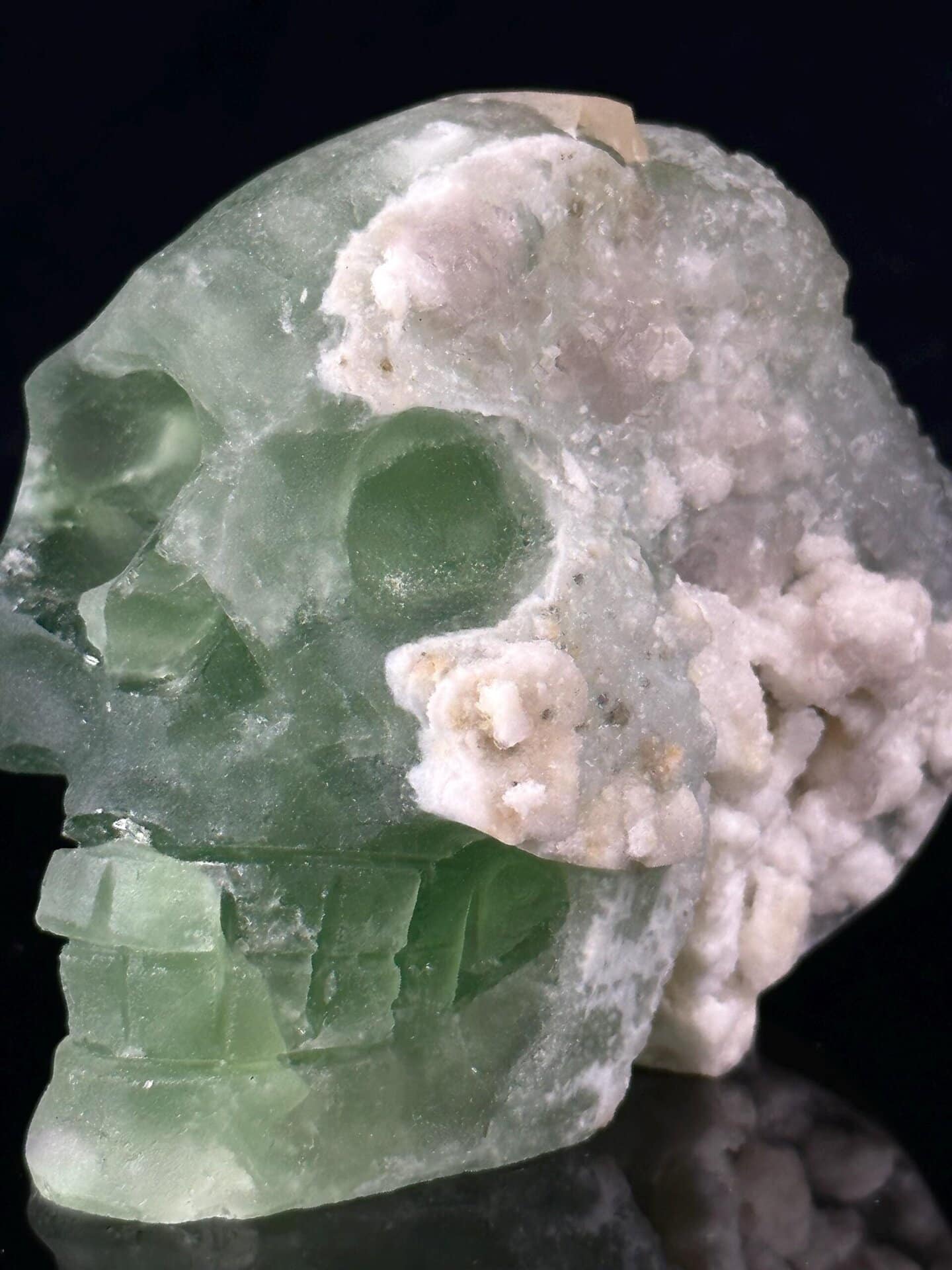 Scale reference of large green fluorite skull 3.6 inches