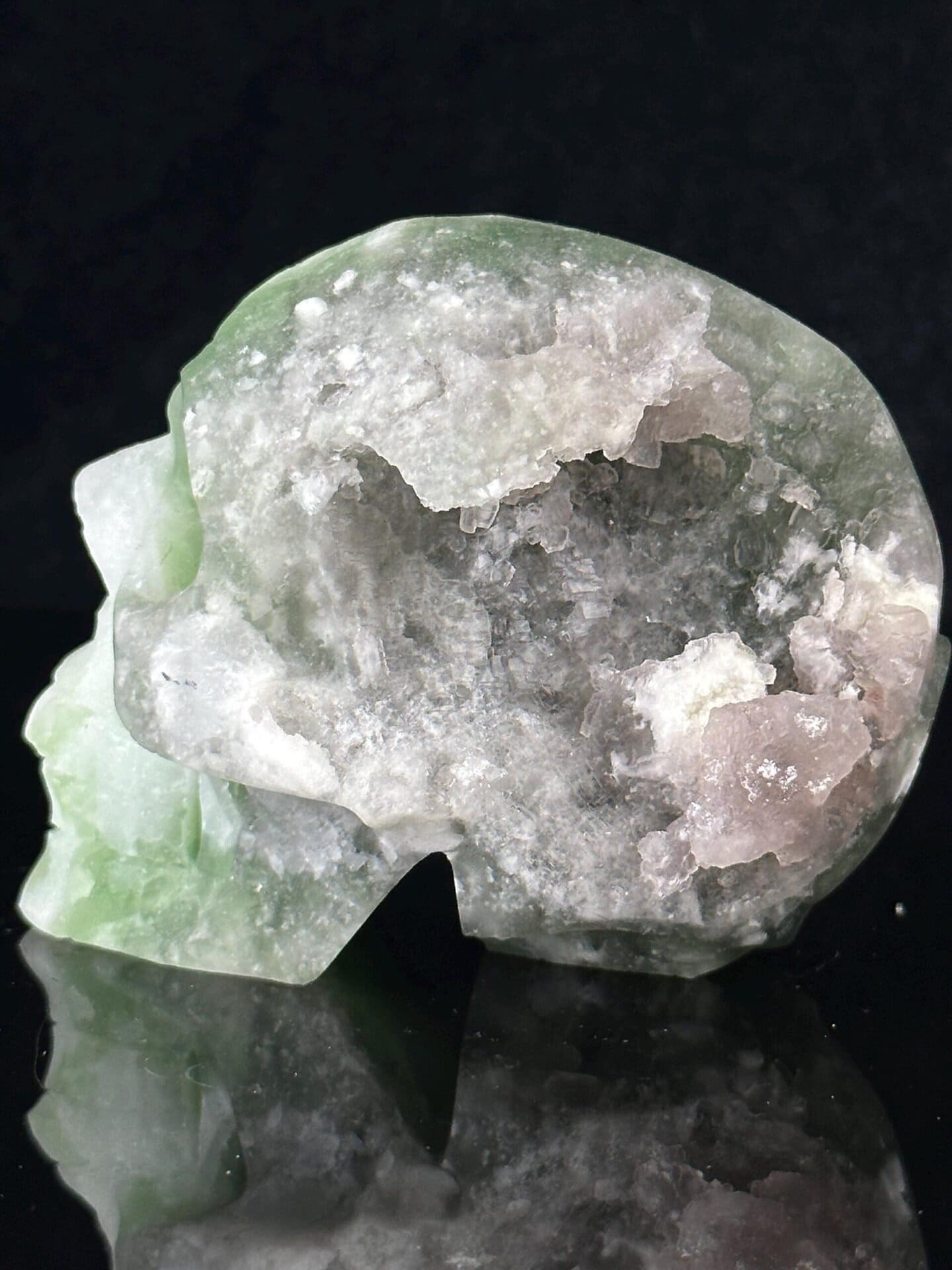 Green fluorite skull with geode interior, Chinese mineral carving
