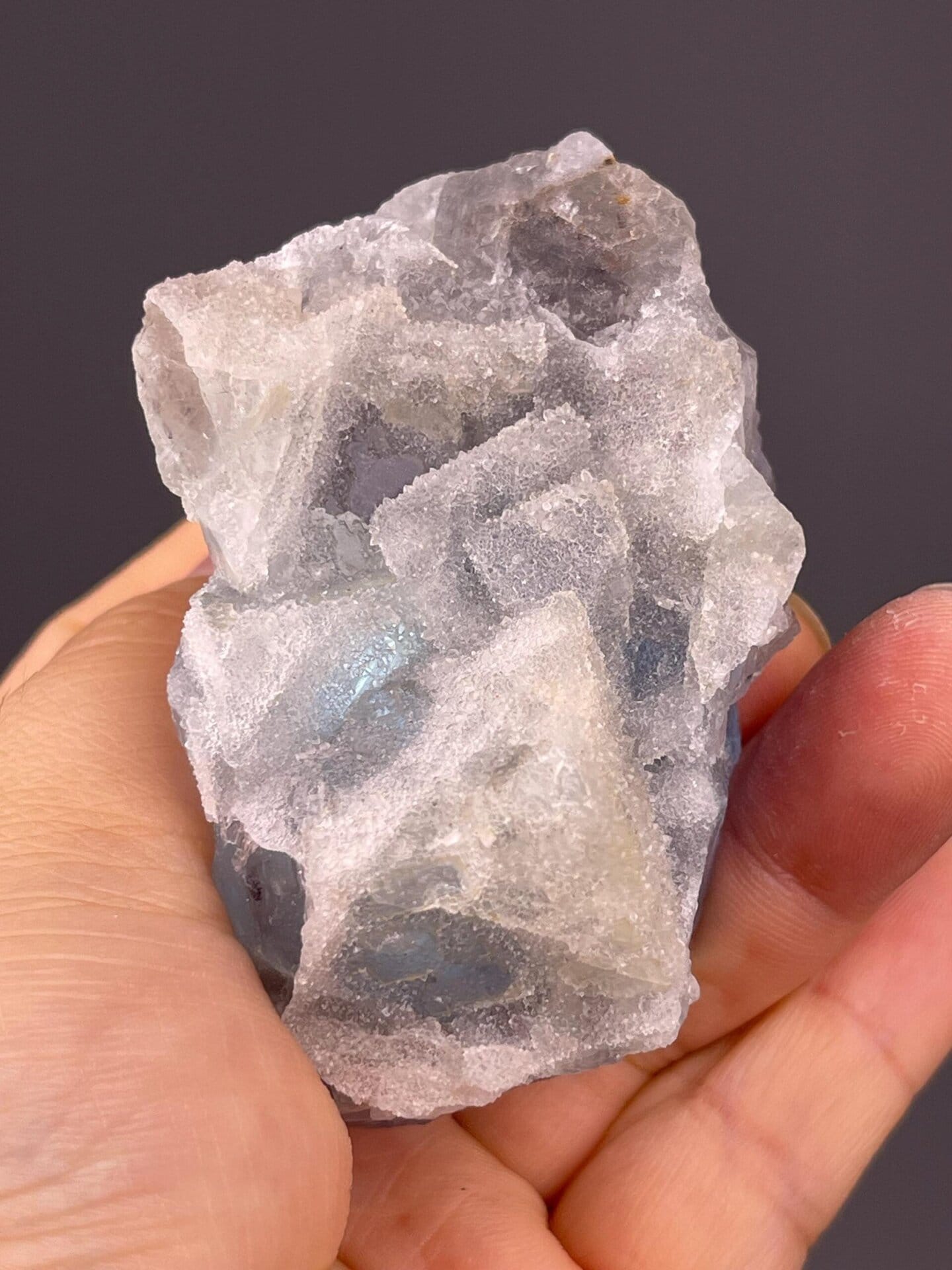 Blue fluorite with sugar-coated microcrystalline overgrowth and etched surfaces, Fujian