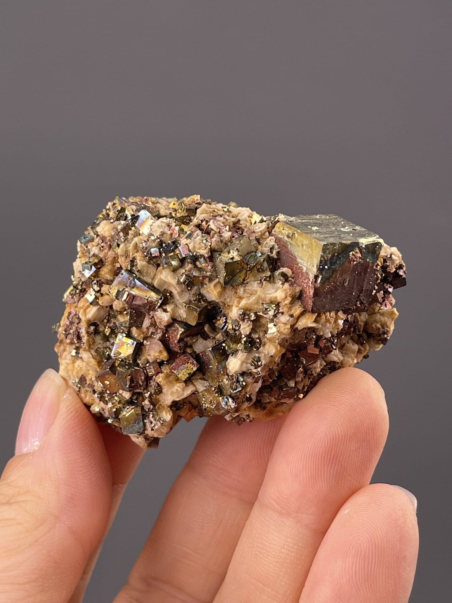 Side view of chalcopyrite showing metallic iridescent surface