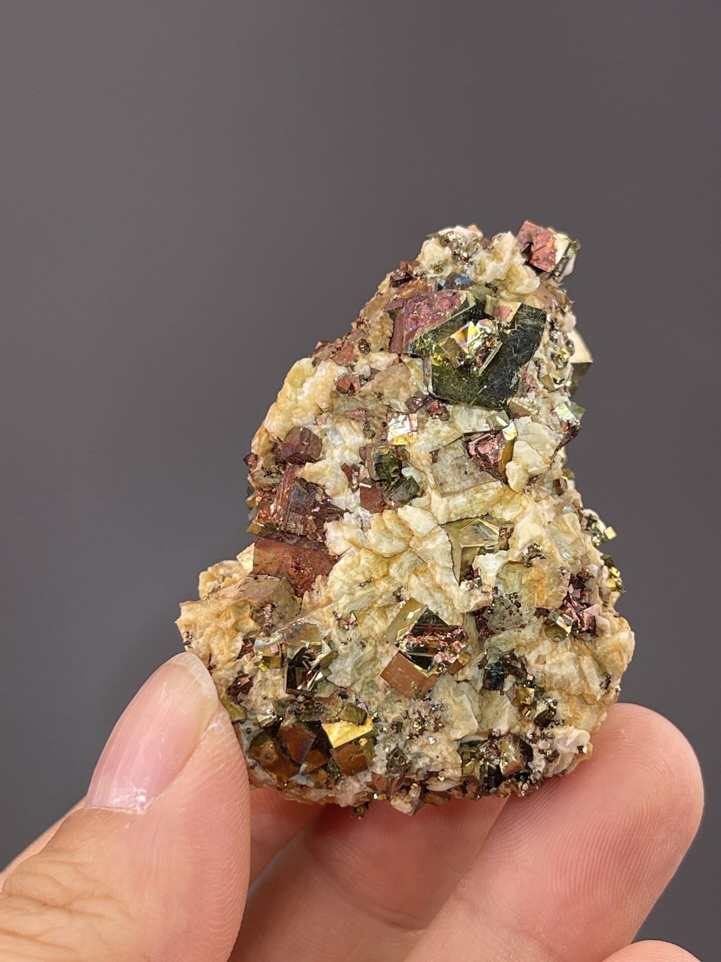 Angled view of Dexing chalcopyrite highlighting iridescence