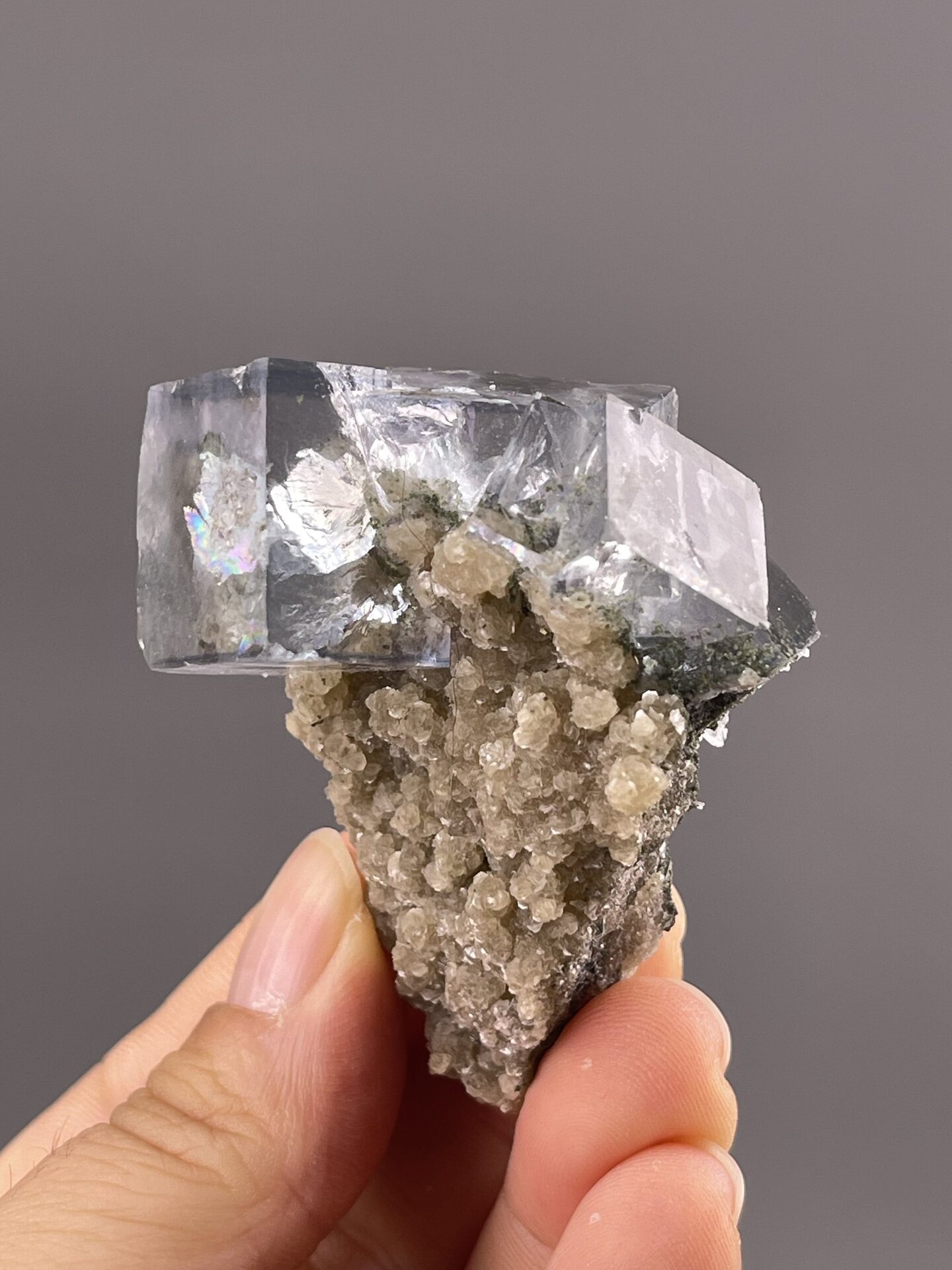 Transparent Fluorite Crystal from Yaogangxian Mine, China – angled view showing matrix