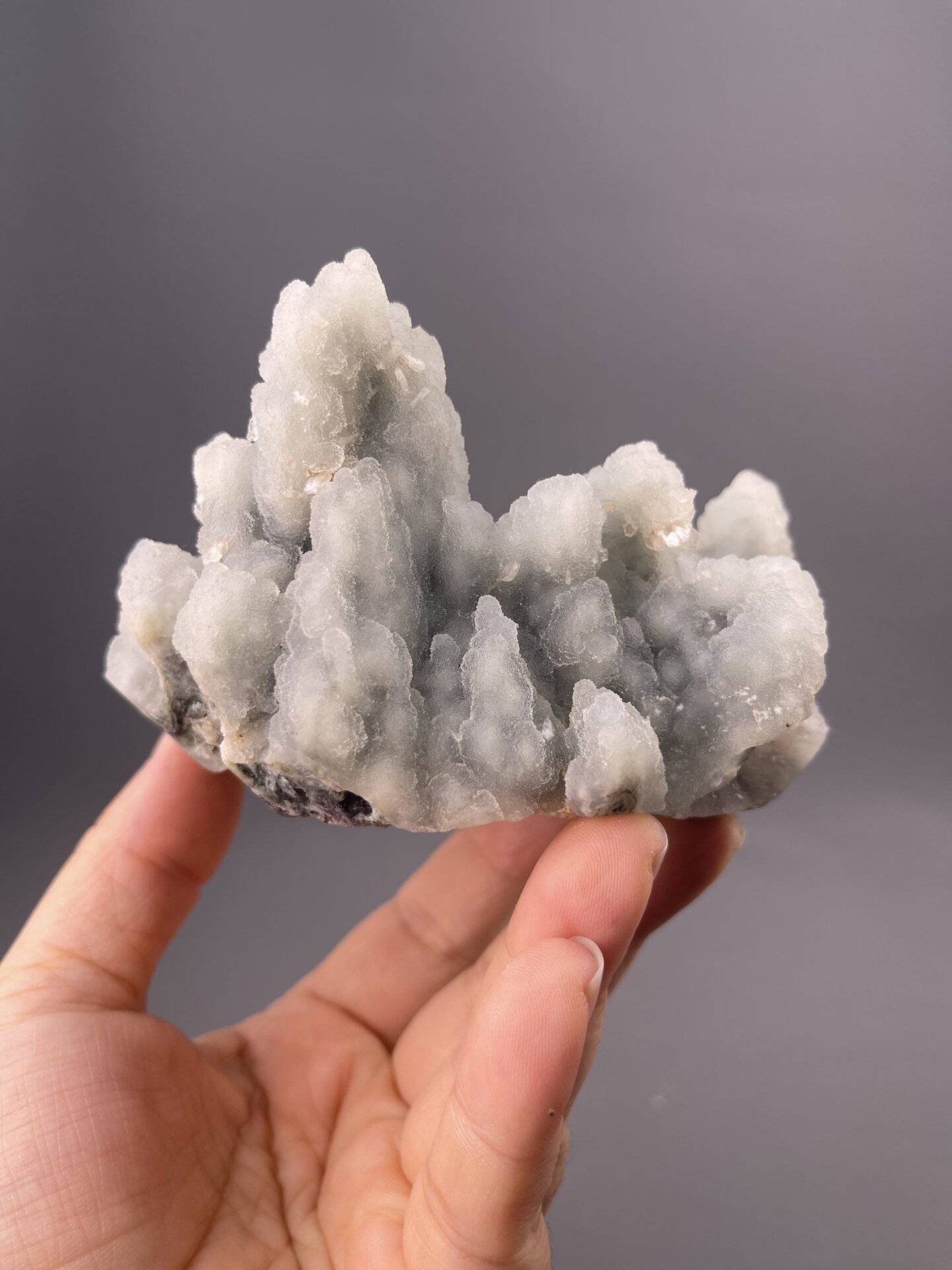 Smooth matte quartz surface detail showing interlocking botryoids