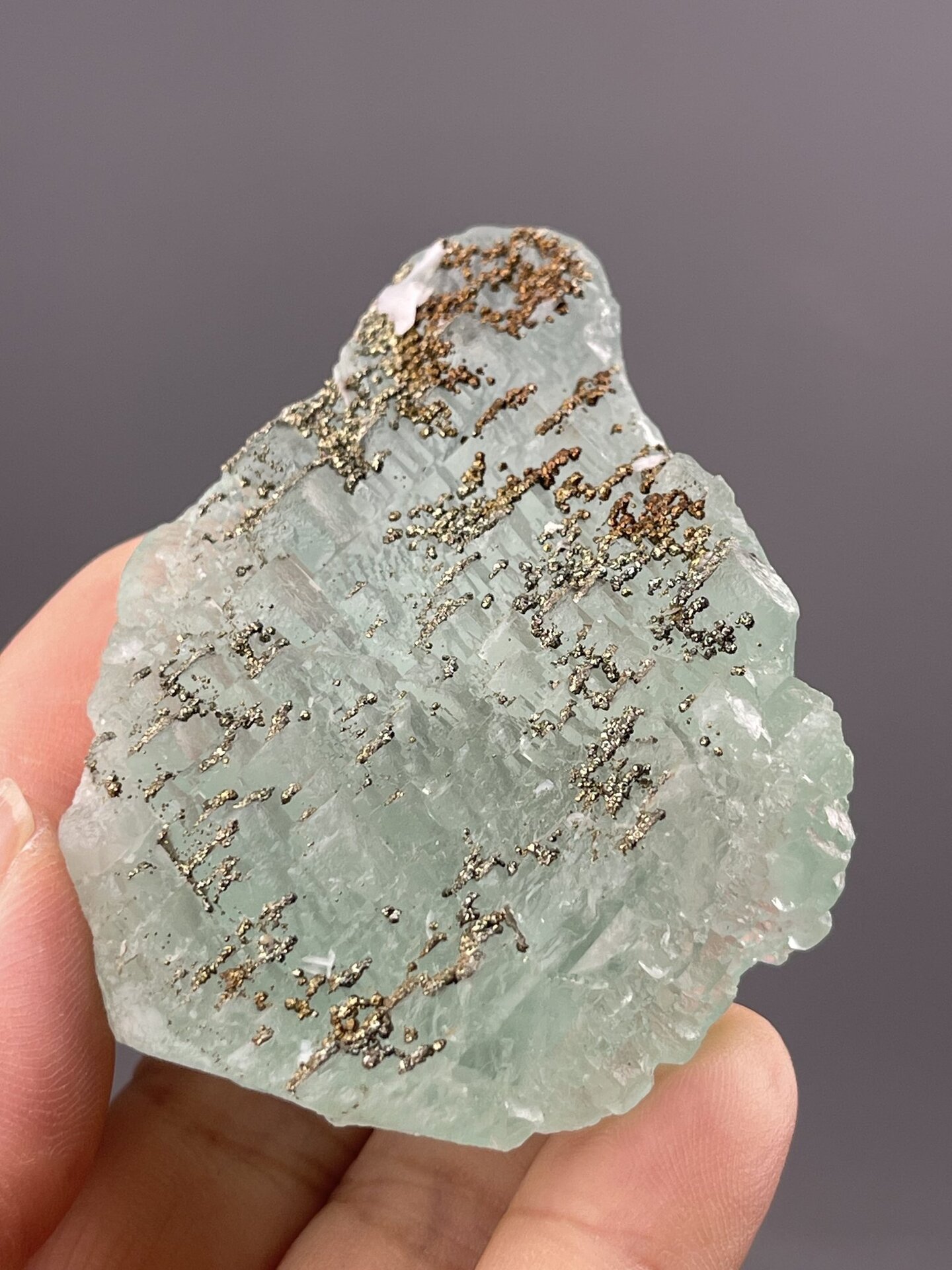 Translucent Light Green Fluorite Cube from Yaogangxian Mine – close-up of crystal surface