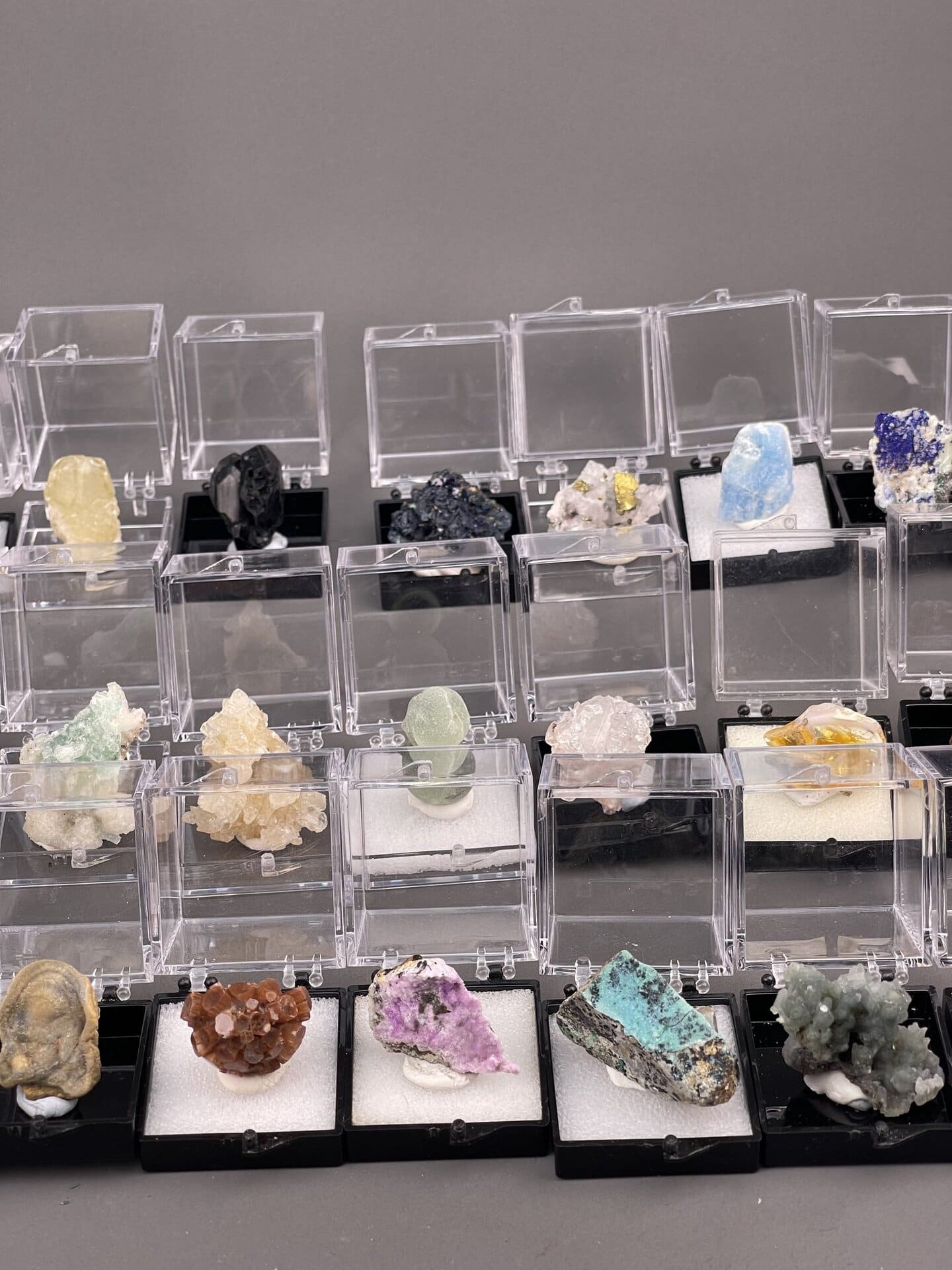 Top view of mineral collection showing assorted specimens