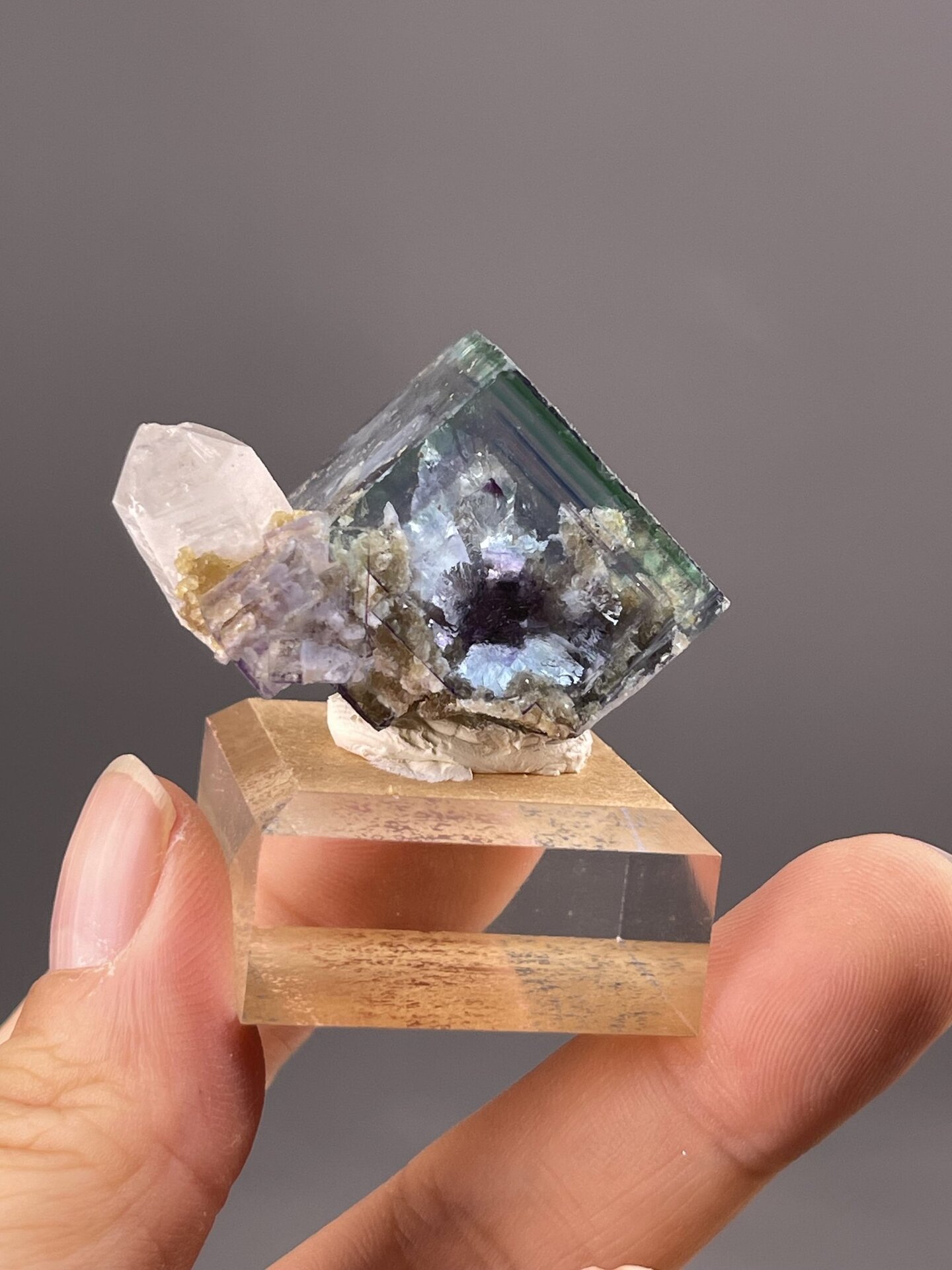 Vibrant Cubic Fluorite Crystals from Chenzhou, China – angled view showing matrix