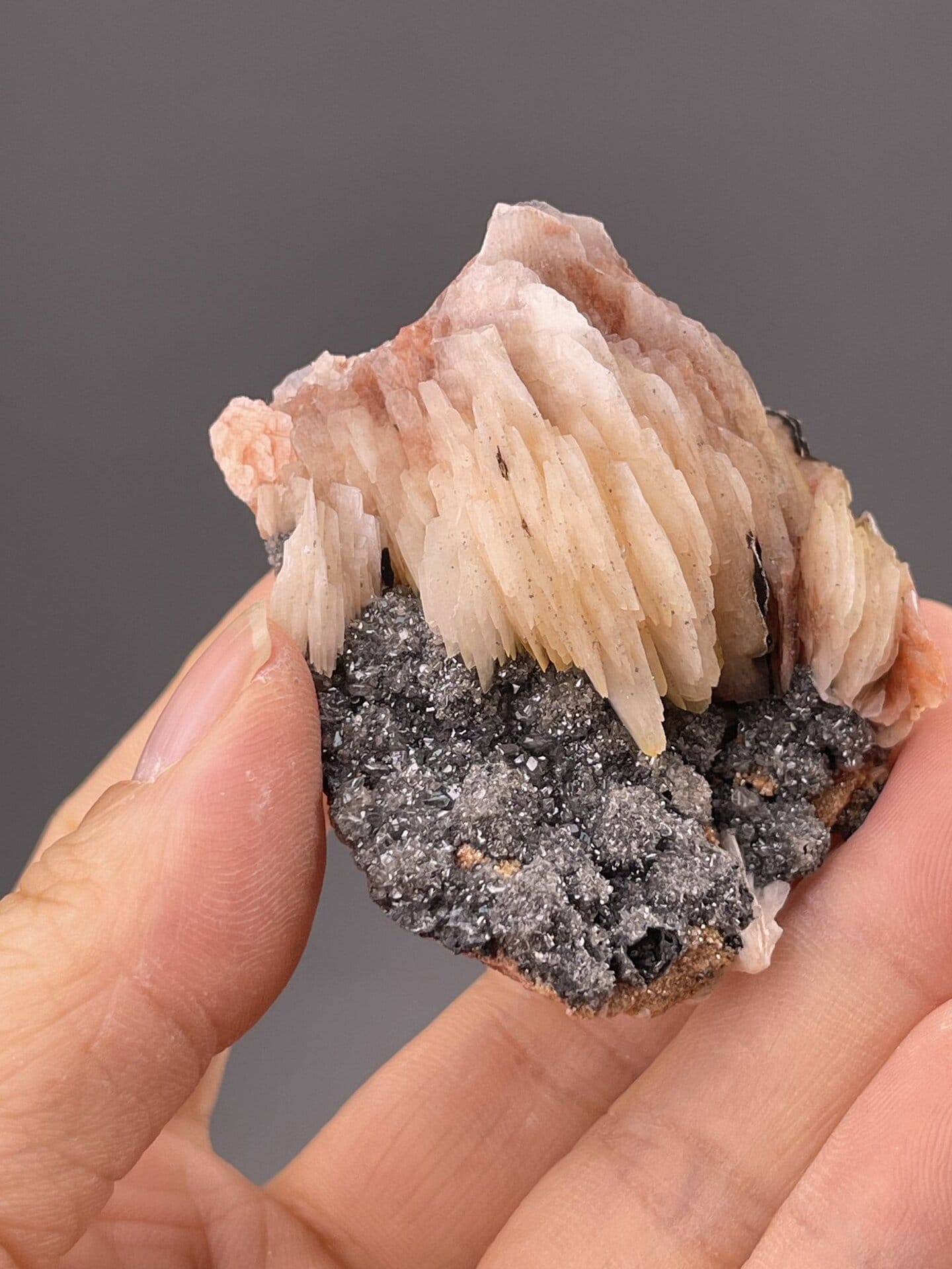 Close-up of barite crystal faces showing pink coloration