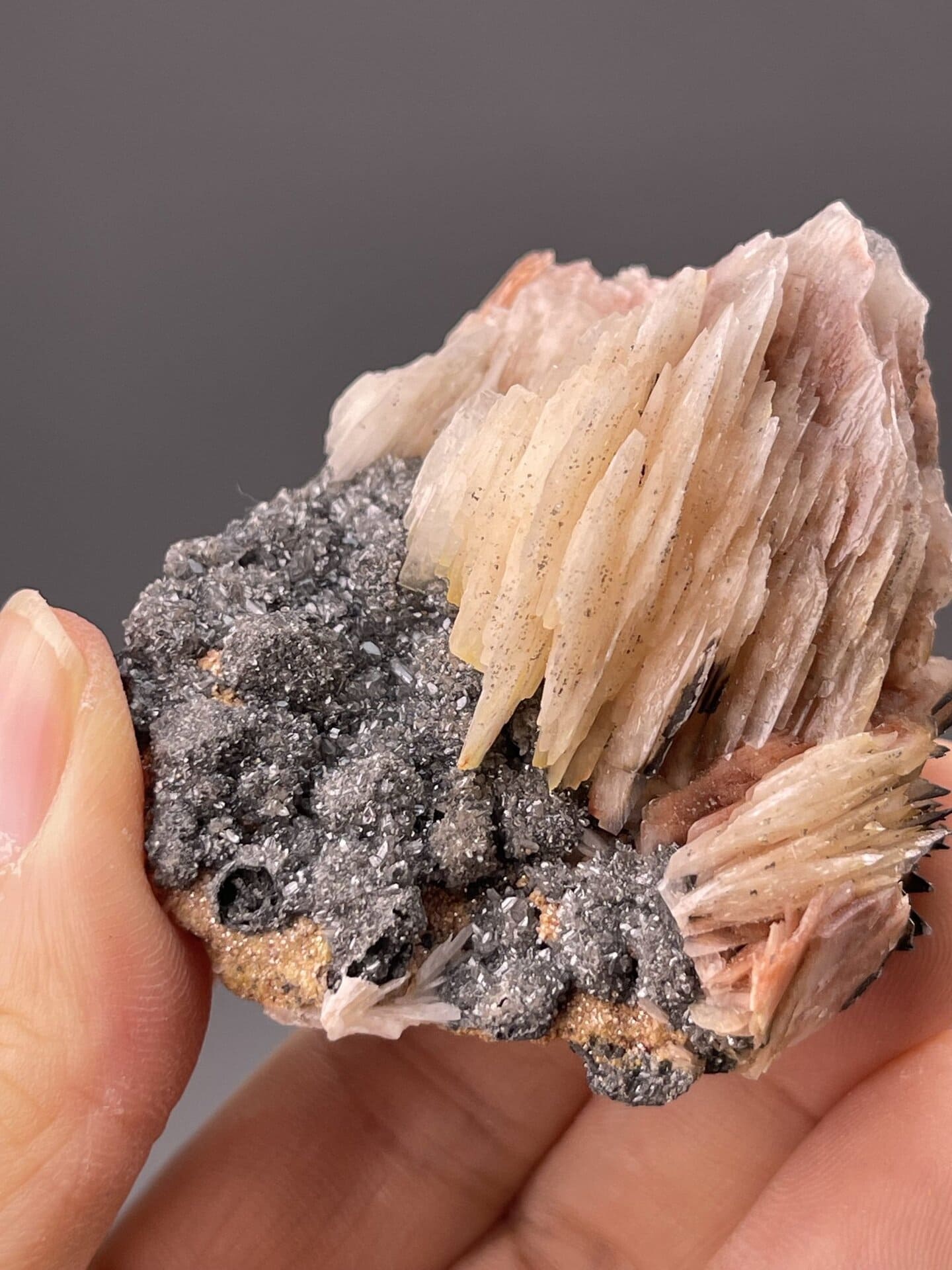 Detail of barite surfaces showing vitreous luster and pink tone
